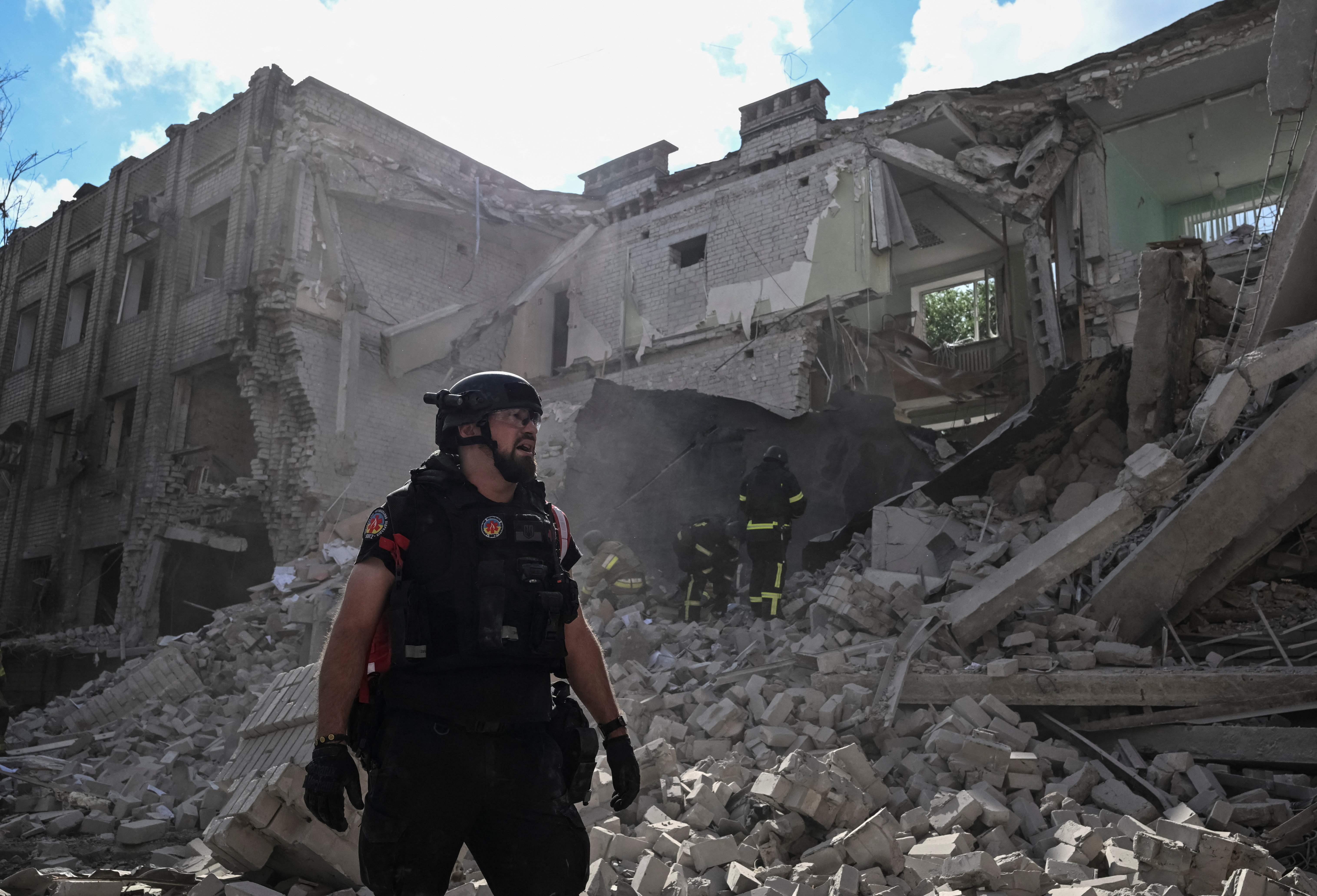 Rescuers and medical workers work at the site of a Russian air strike, amid Russia's attack on Ukraine, in Zaporizhzhia, Ukraine July 10, 2026. REUTERS/Stringer