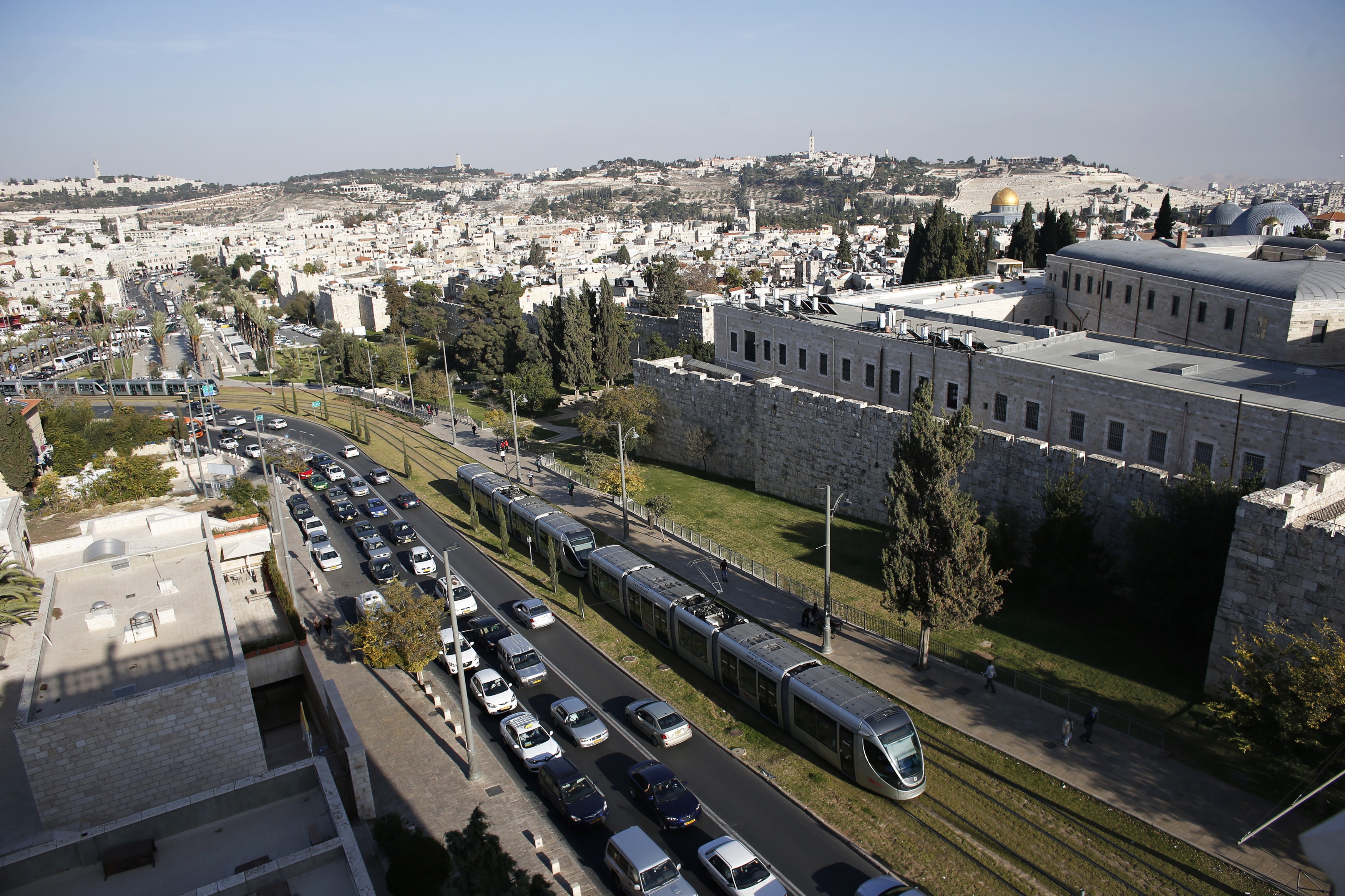 A general view shows Jerusalem's light rail tram as it passes by the old city's walls in Jerusalem November 13, 2014. If there has been a constant target of Palestinian attacks during weeks of unrest in Jerusalem, it is the city's Light Rail, a sleek tram that snakes through downtown, past the ancient walls of the Old City, symbolically uniting the Jewish West and the Arab East, an area Israel captured in a 1967 war. Launched in 2011, the project was hailed as a piece of infrastructure that would transform the city, bringing Israelis and Palestinians closer through shared public rail transport. While in some ways that has happened, the past few months have torn that cosmopolitan picture apart. Picture taken November 13, 2014. REUTERS/Ronen Zvulun (JERUSALEM - Tags: TRANSPORT POLITICS CIVIL UNREST TPX IMAGES OF THE DAY)ATTENTION EDITORS: PICTURE 01 OF 26 PICTURES FOR WIDER IMAGE STORY 'RIDING THE FINE LINE'
SEARCH 'TRAM RONEN' FOR ALL IMAGES