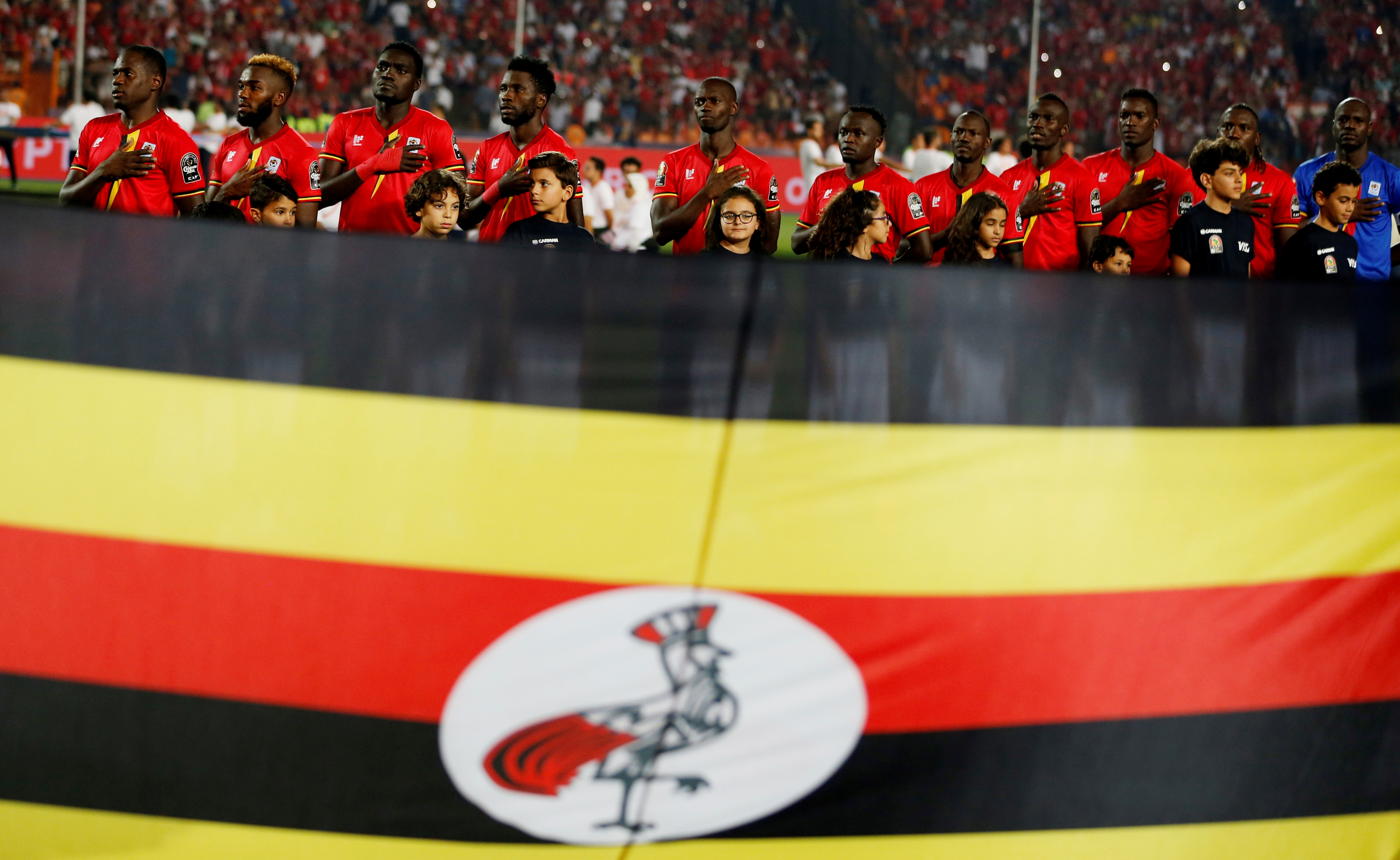 Uganda players line up before an Africa Cup of Nations match against Egypt