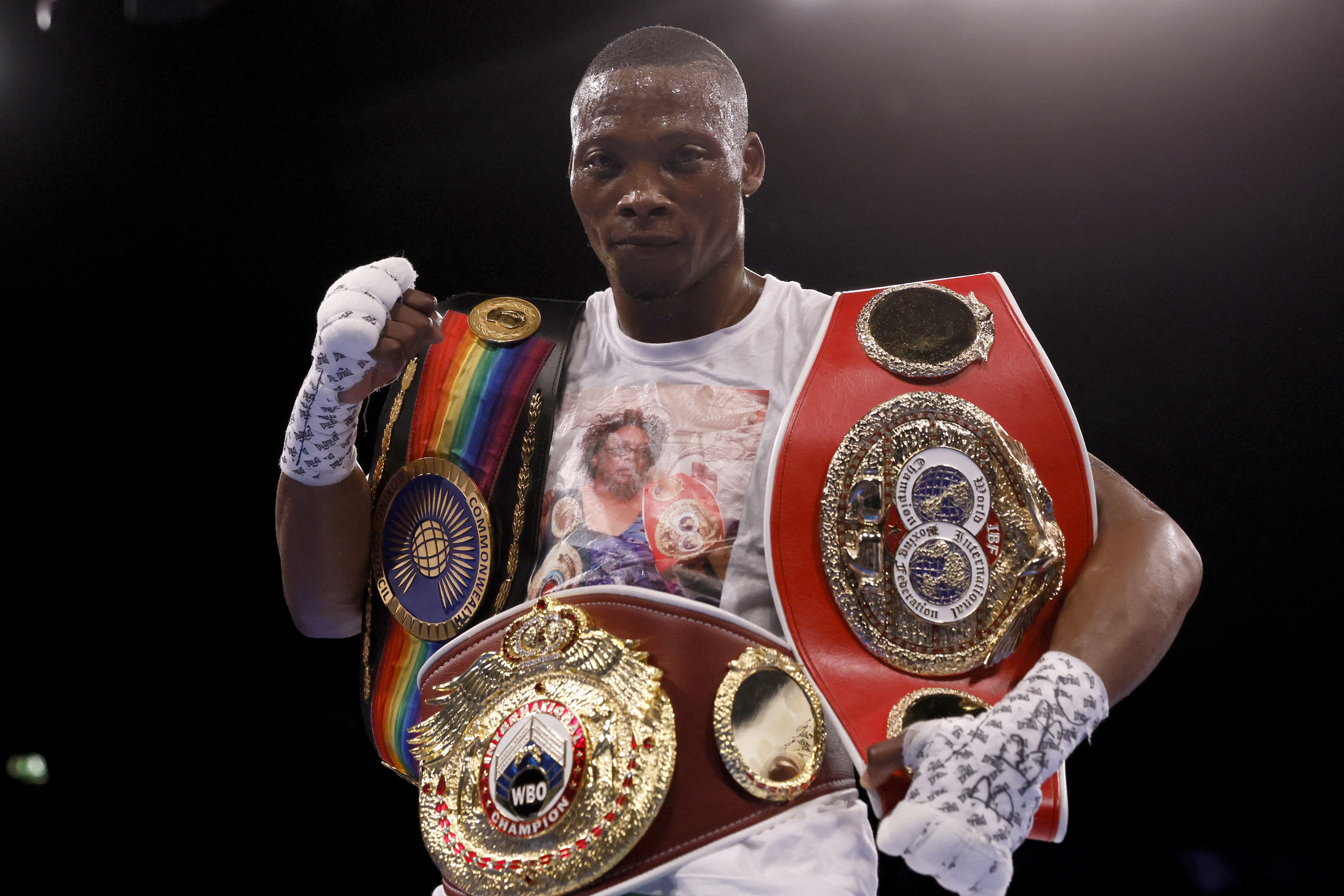 Zolani Tete celebrates after beating Jason Cunningham after their super-bantamweight fight