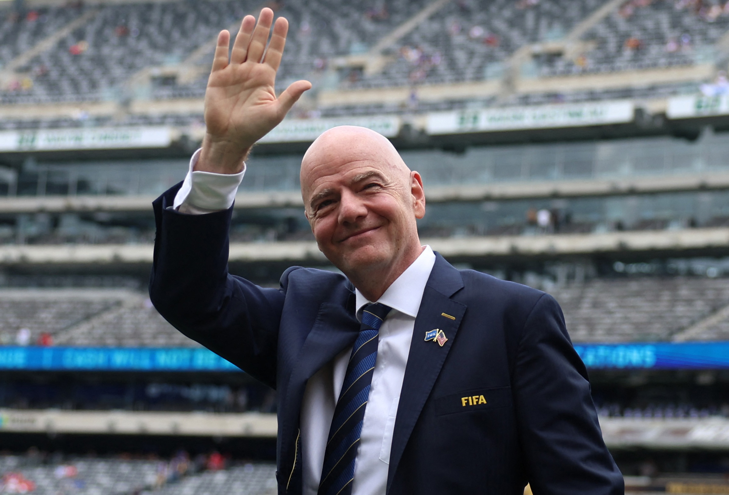 FIFA president Gianni Infantino waves