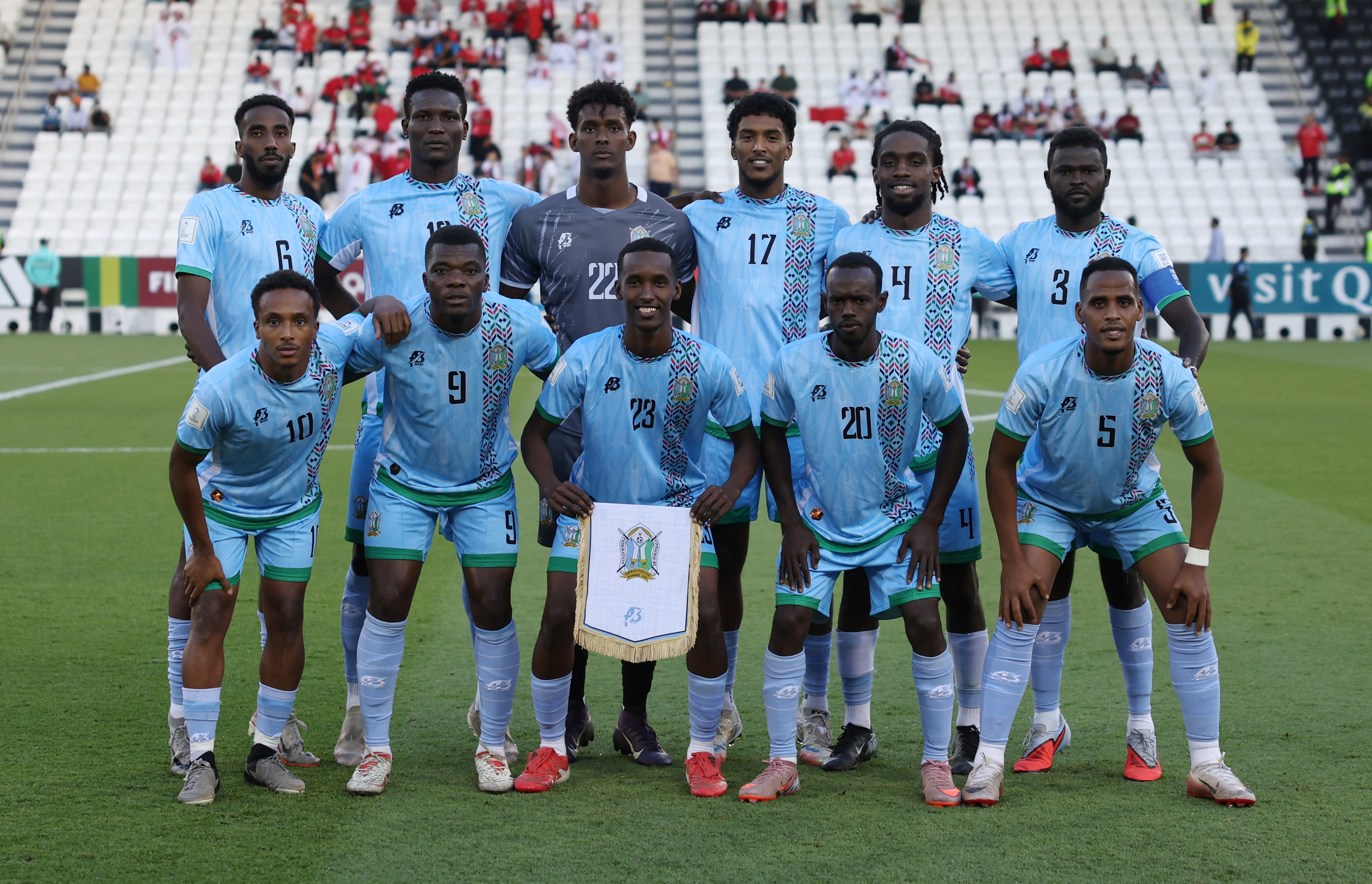 Soccer Football - FIFA Arab Cup - Qatar 2025 - Qualifying - Bahrain v Djibouti - Jassim bin Hamad Stadium, Doha, Qatar - November 26, 2025 Djibouti players pose for a team group photo before the match REUTERS/Saleh Salem