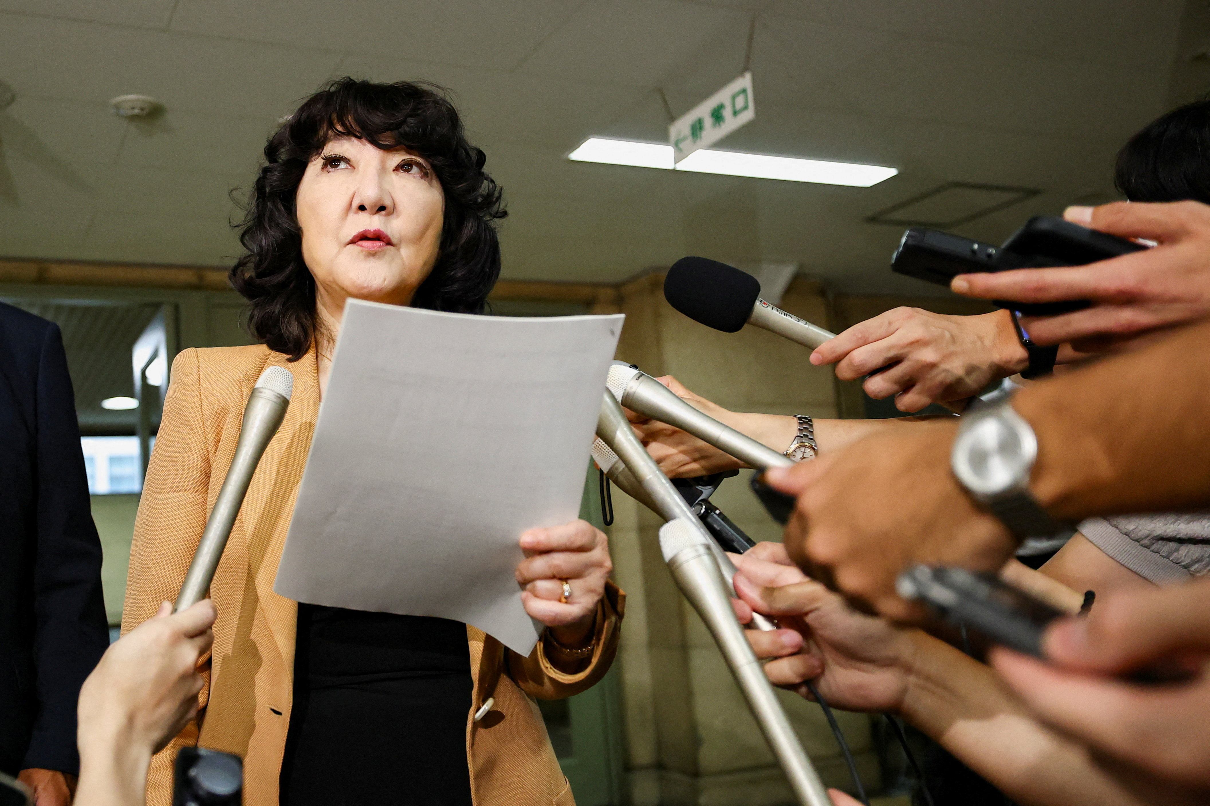 Japan's Finance Minister Satsuki Katayama speaks to the media about the US-Japan joint forex action upon her arrival at the Finance Ministry in Tokyo. [Issei Kato/Reuters]