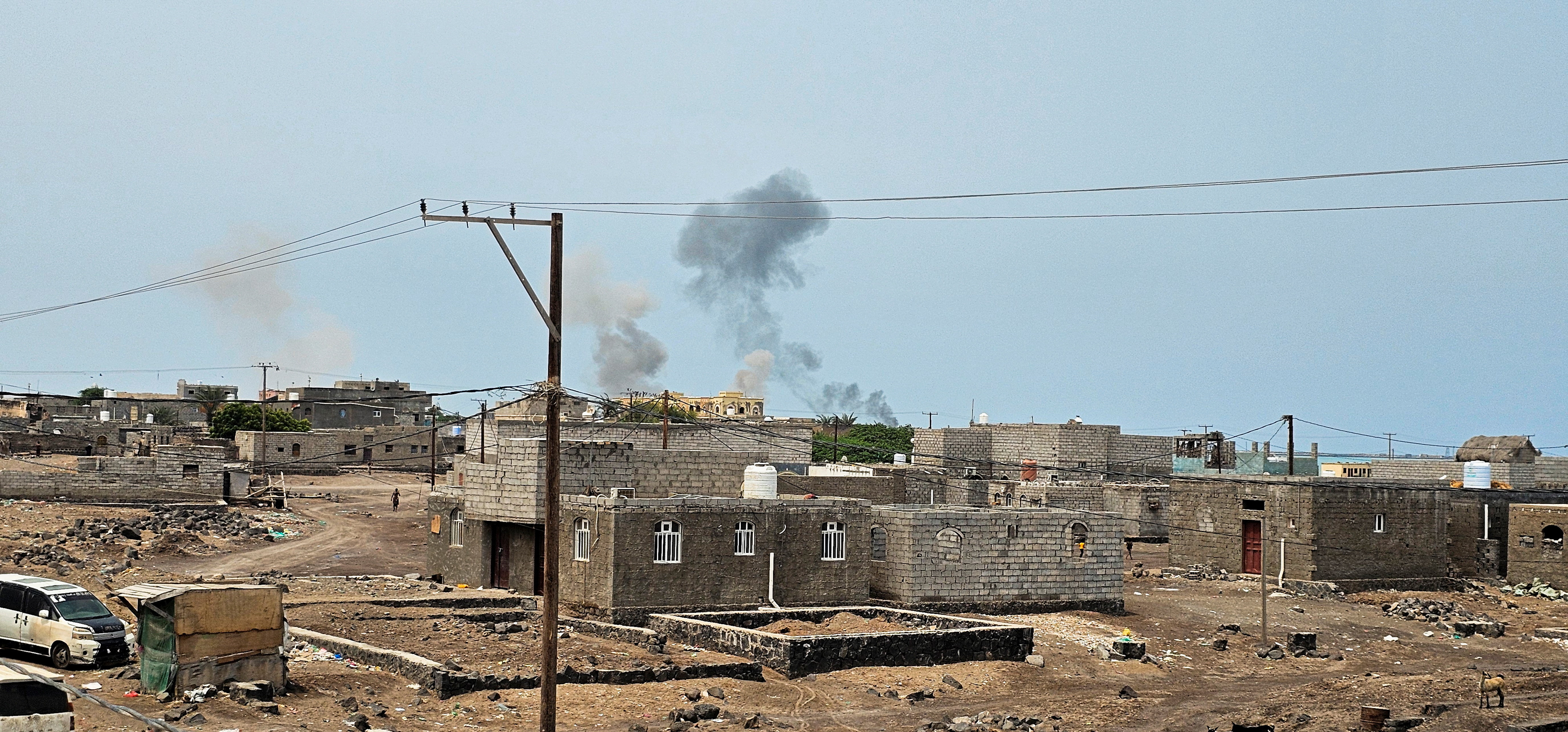 Smoke rises during Houthi missile and drone strikes on the Red Sea port city of Mocha, Yemen, August 9, 2026. Picture taken with a mobile phone. REUTERS/Stringer