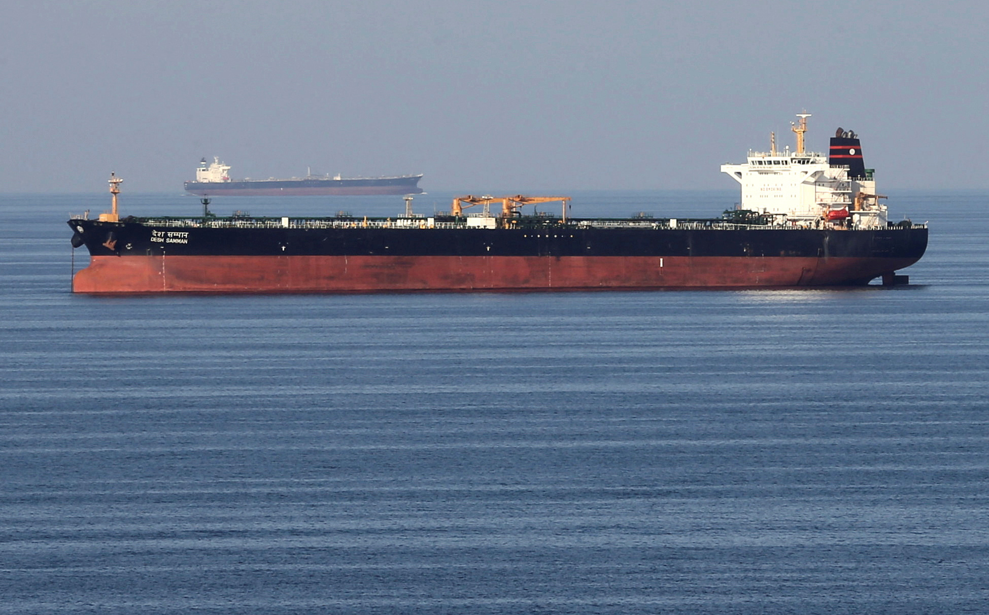 FILE PHOTO: Oil tankers pass through the Strait of Hormuz, December 21, 2018. REUTERS/Hamad I Mohammed/File Photo