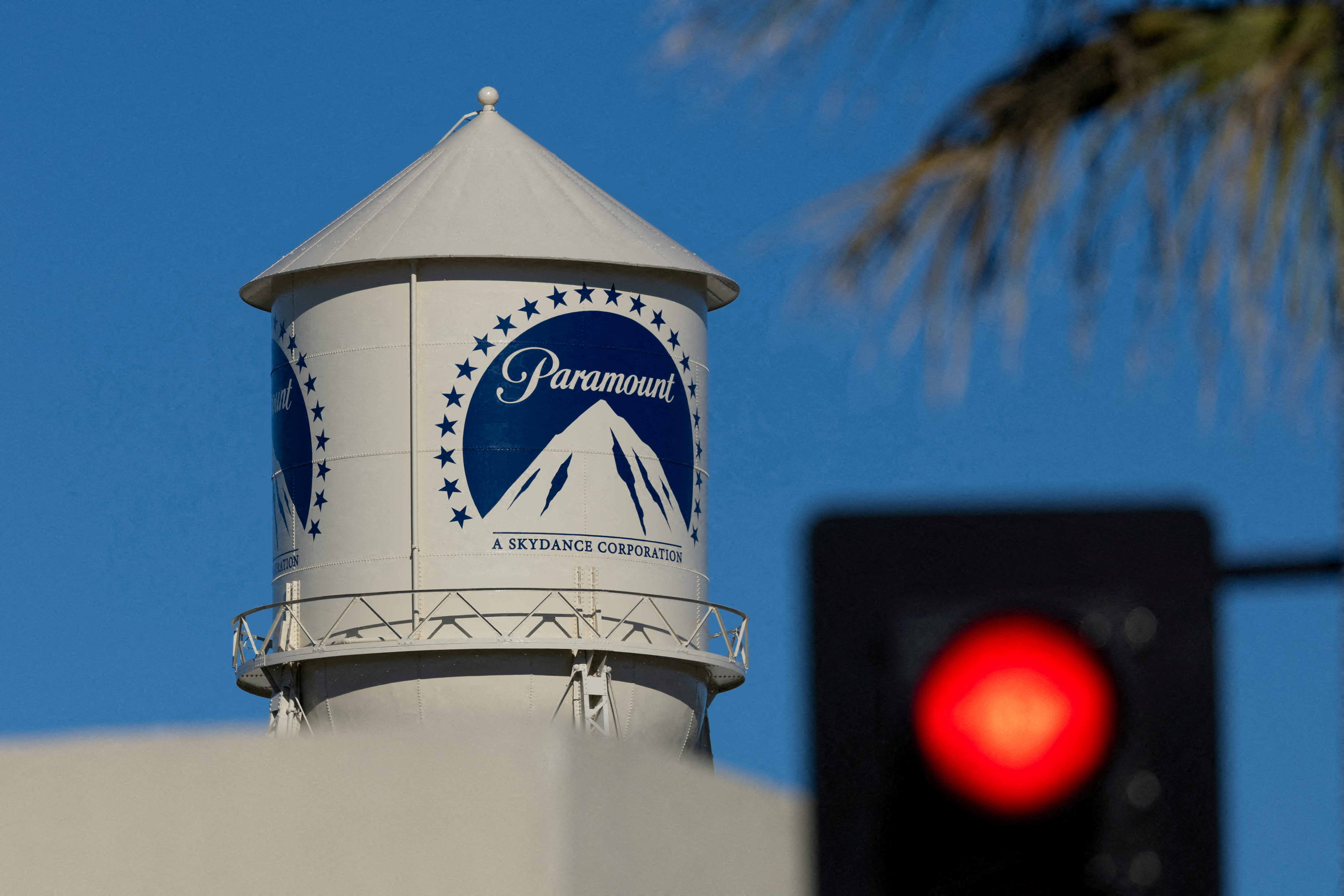 FILE PHOTO: A city street stop sign is shown next to the Paramount water tower at the Paramount studio lot in Hollywood, Los Angeles, California, U.S., January 13, 2026. REUTERS/Mike Blake TPX IMAGES OF THE DAY/File Photo