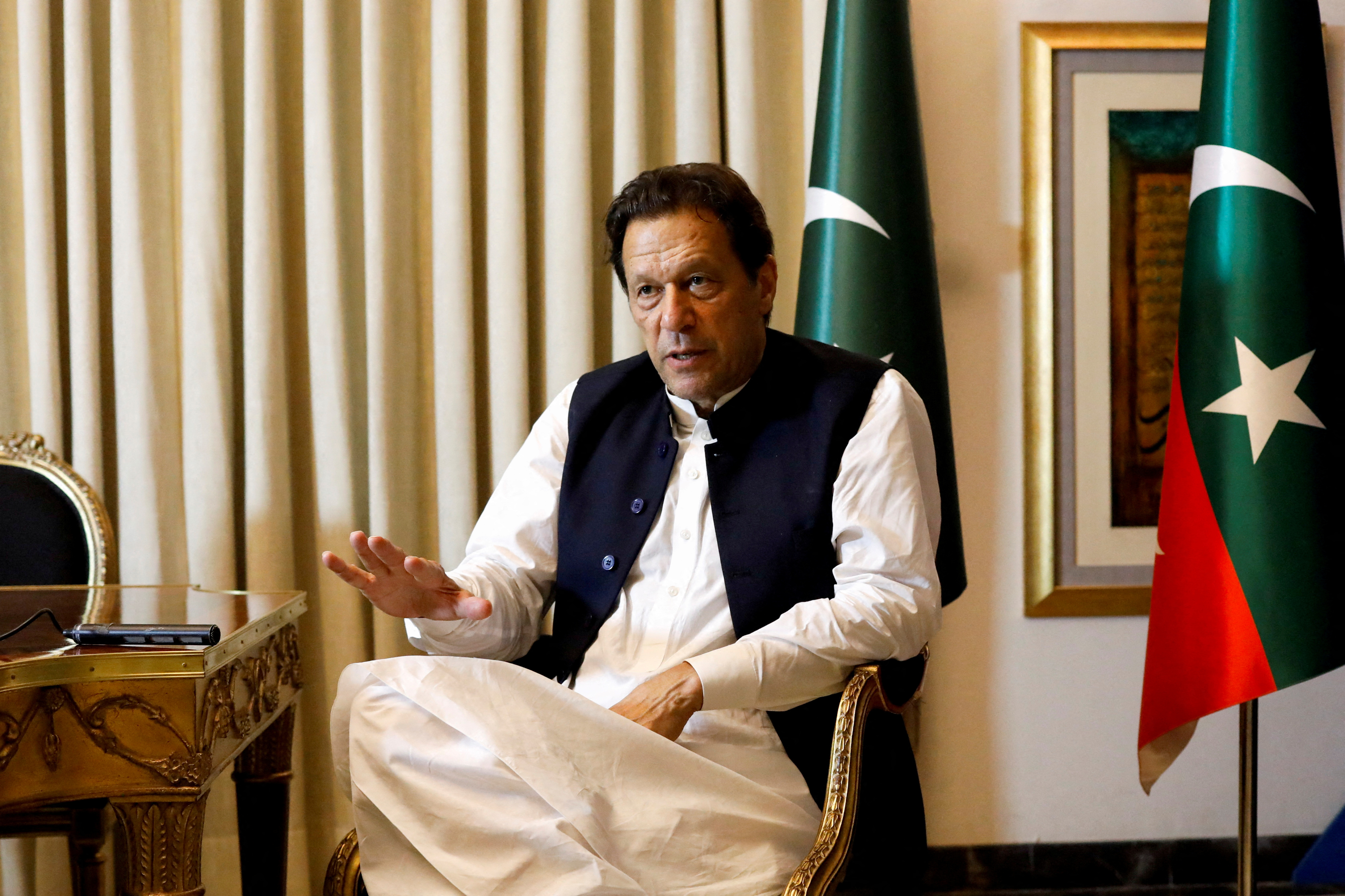 FILE PHOTO: Former Pakistani Prime Minister Imran Khan speaks with Reuters during an interview, in Lahore, Pakistan March 17, 2023. REUTERS/Akhtar Soomro/File Photo