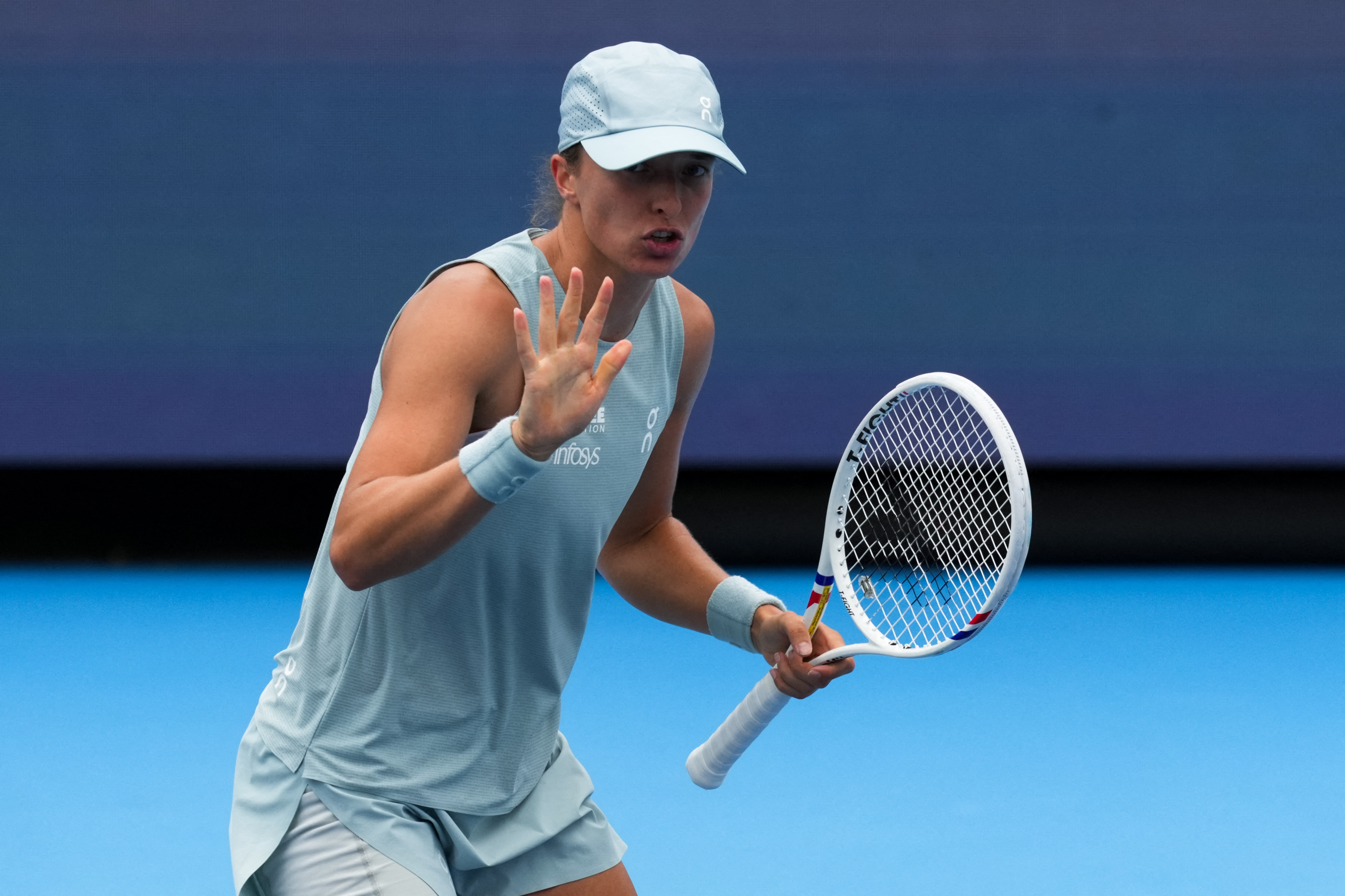 Iga Swiatek (POL) reacts after returning a shot against Diane Parry (FRA) during the Cincinnati Open