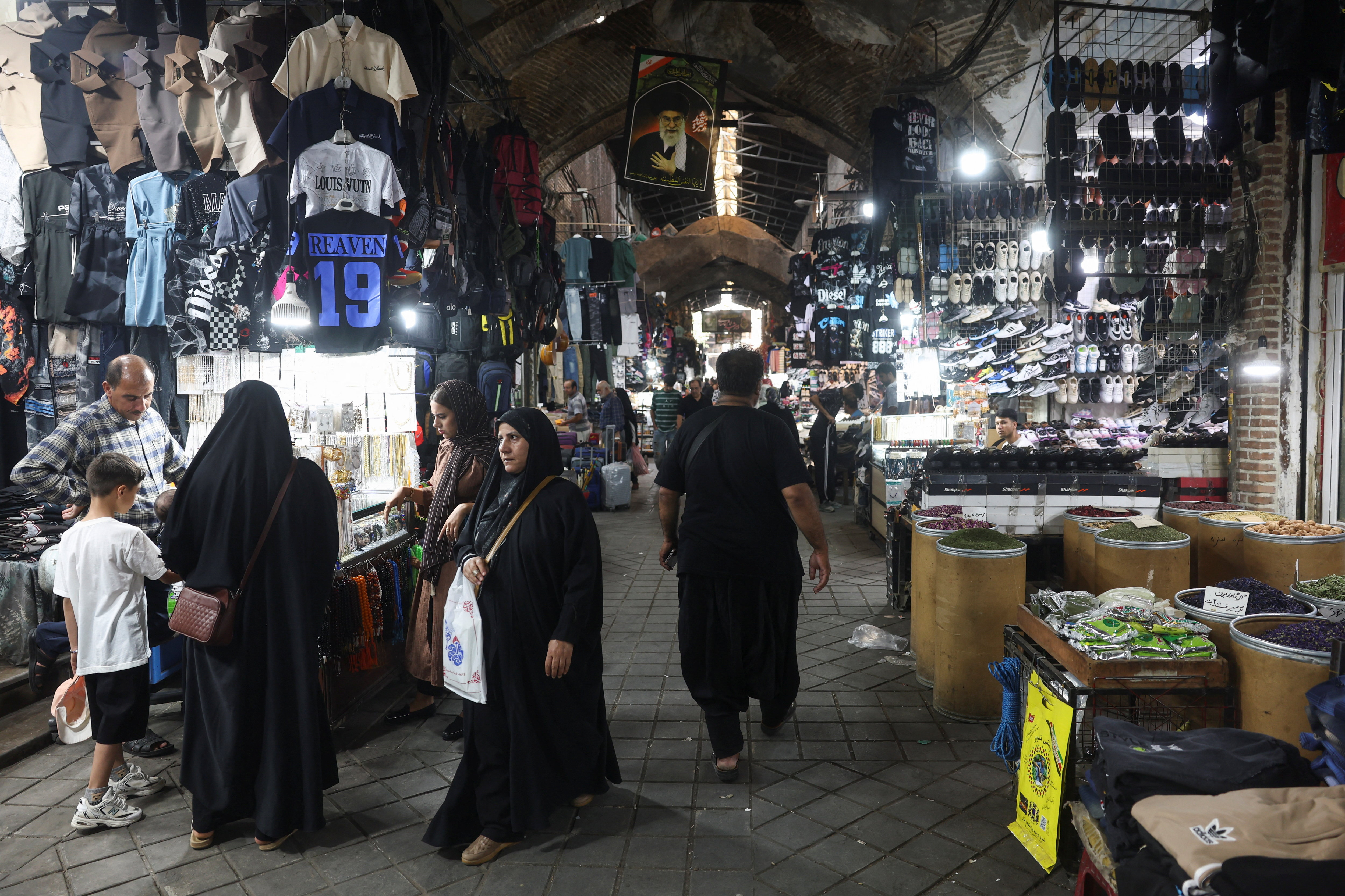 People walk in the Grand Bazaar in Tehran, Iran, August 23, 2026. Majid Asgaripour/WANA (West Asia News Agency) via REUTERS ATTENTION EDITORS - THIS PICTURE WAS PROVIDED BY A THIRD PARTY. ISRAEL OUT. NO COMMERCIAL OR EDITORIAL SALES IN ISRAEL. NO ACCESS FOR ISRAELI MEDIA. NO USE BBC PERSIAN. NO USE VOA PERSIAN. NO USE MANOTO. NO USE IRAN INTERNATIONAL. NO USE RADIO FARDA. DIGITAL: NO USE BBC PERSIAN. NO USE VOA PERSIAN. NO USE MANOTO. NO USE IRAN INTERNATIONAL. NO USE RADIO FARDA.