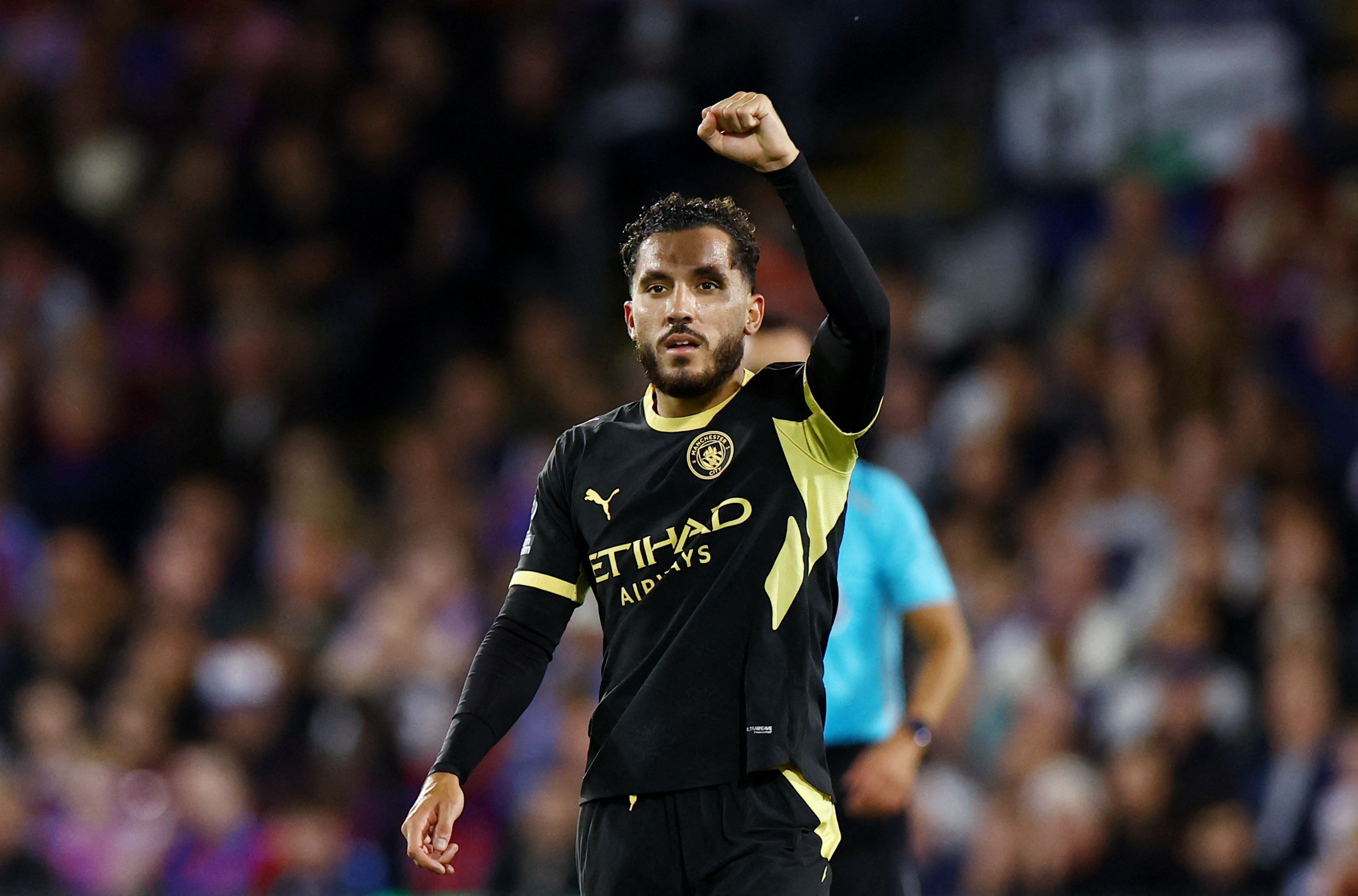 Manchester City's Rayan Cherki celebrates scoring their third goal