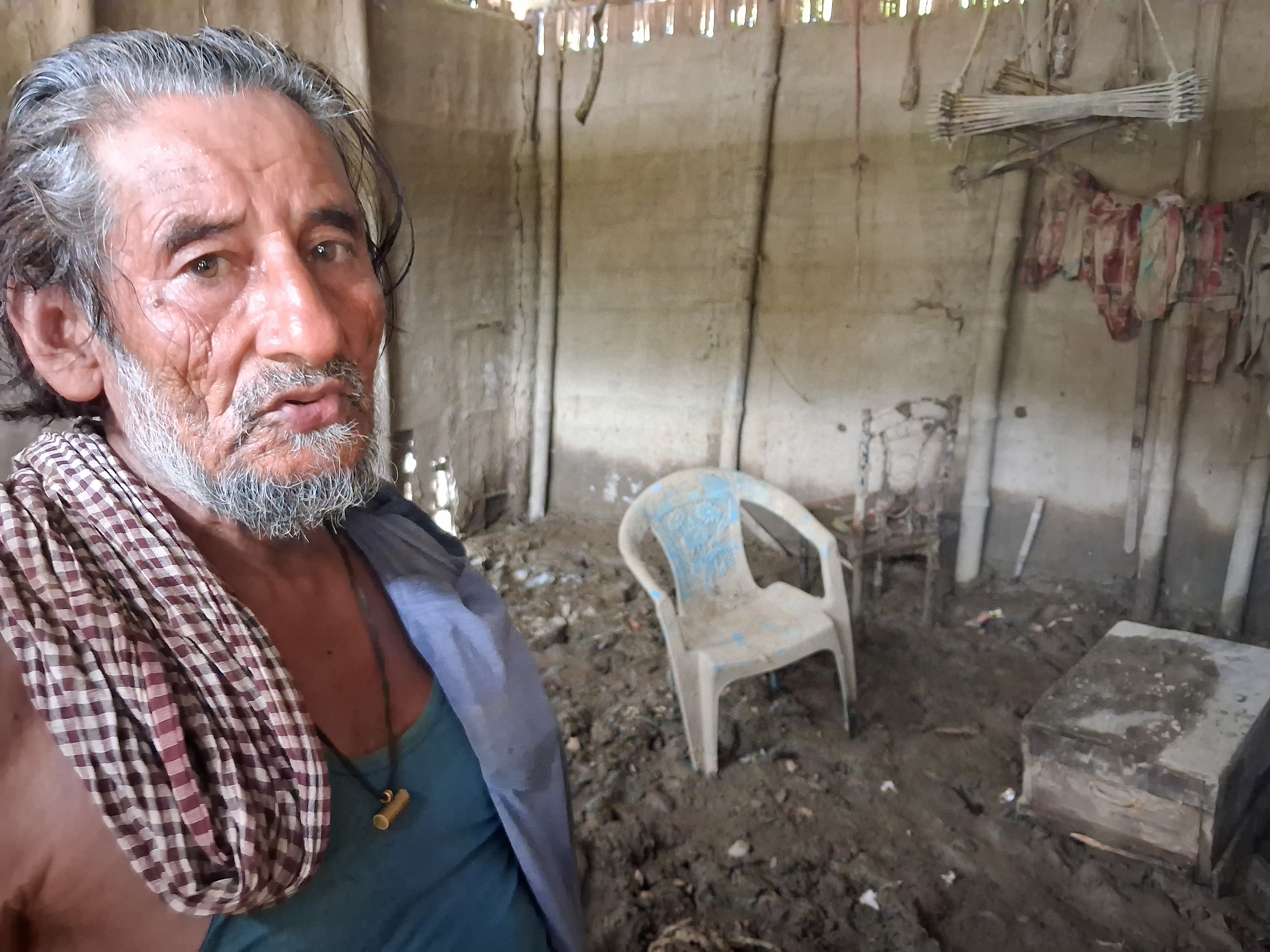 Asor Ali, 75, in Prajabasti, a flood-affected village in Assam, India [Arshad Ahmad/Al Jazeera]