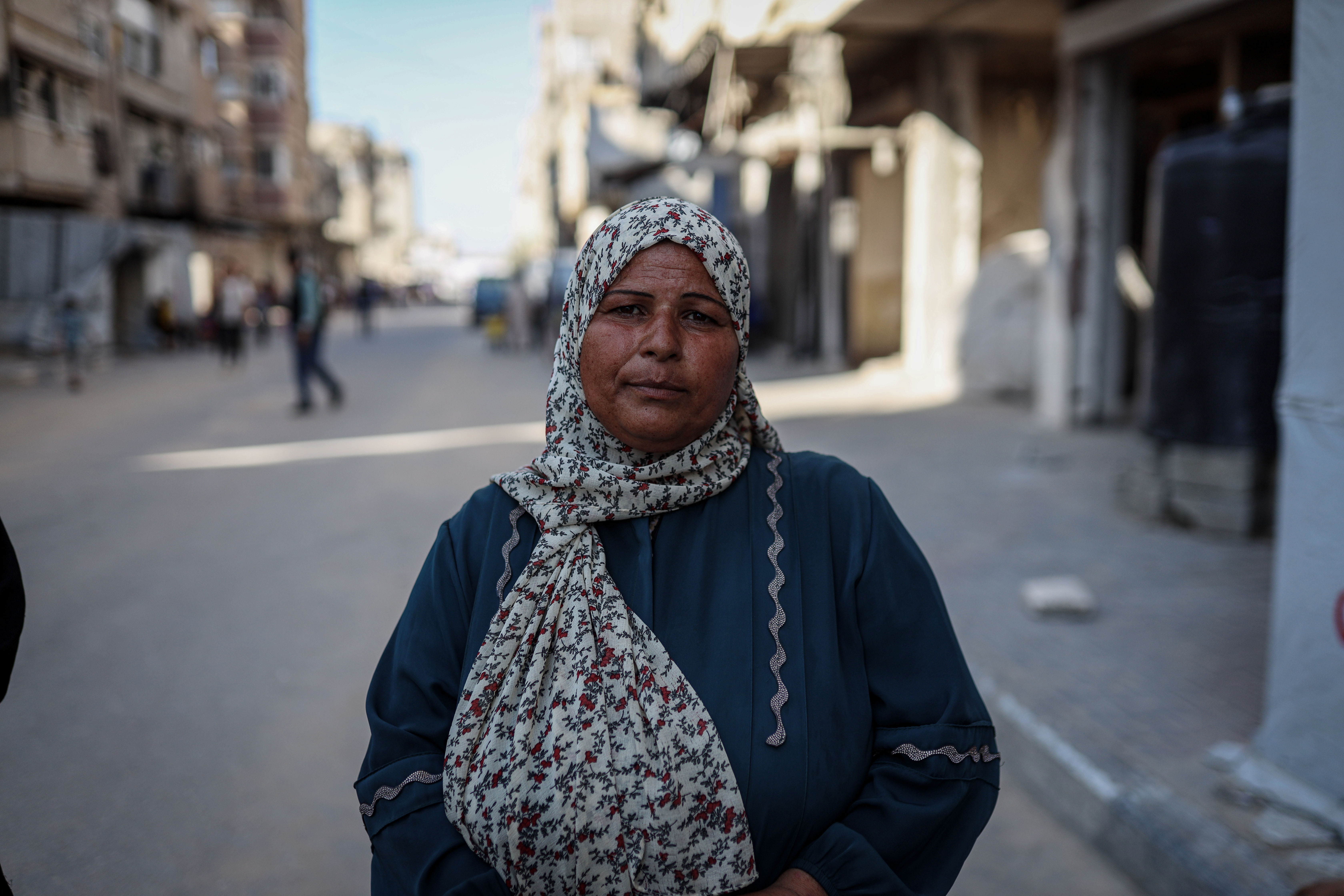 Samah Abu Amra, a mother of five orphaned children, lost her husband during the first months of the war in Gaza in an Israeli strike [Abdelhakim Abu Riash/ Al Jazeera]
