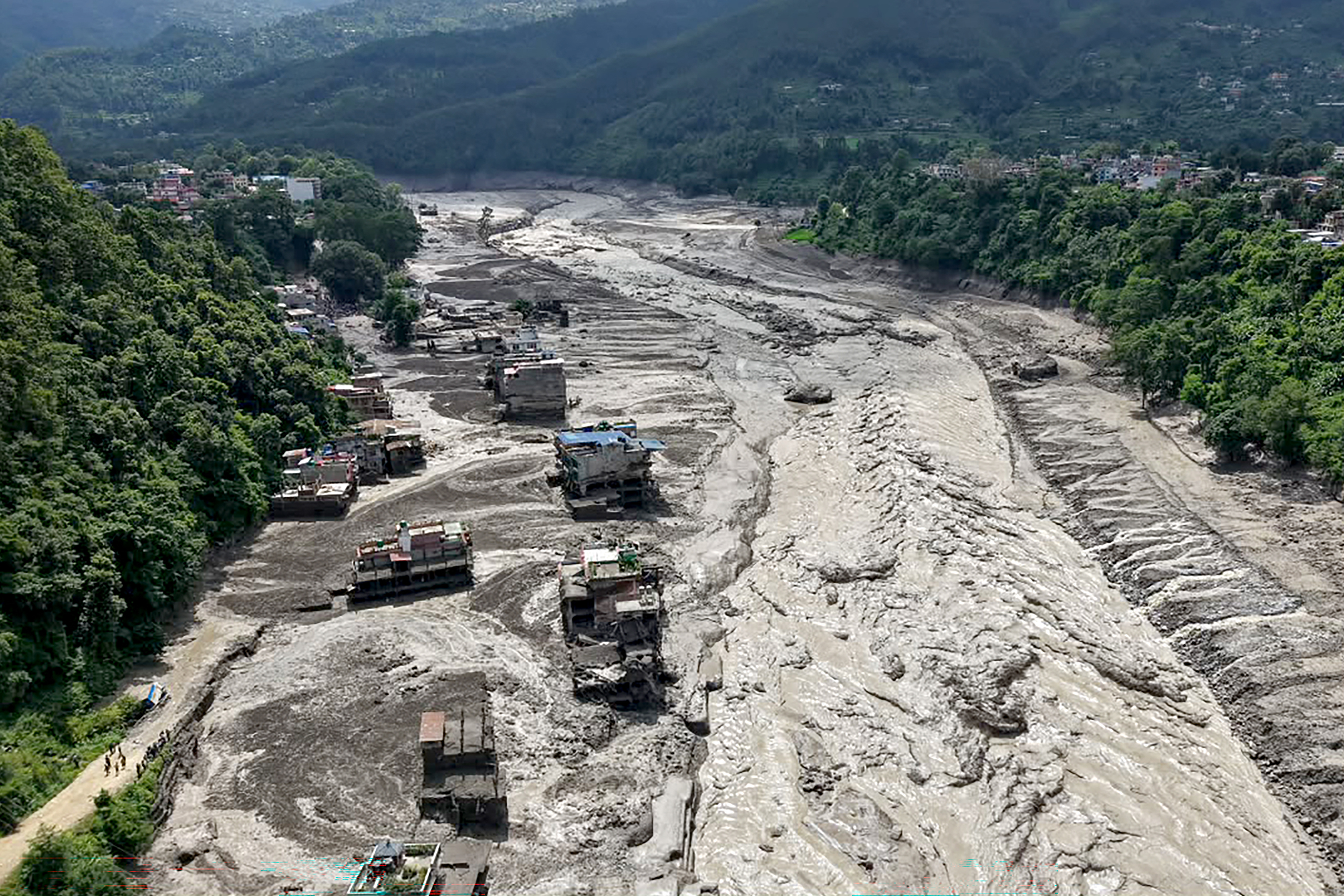 Torrential floods devastate Nepal, Tibet; nine dead, more missing