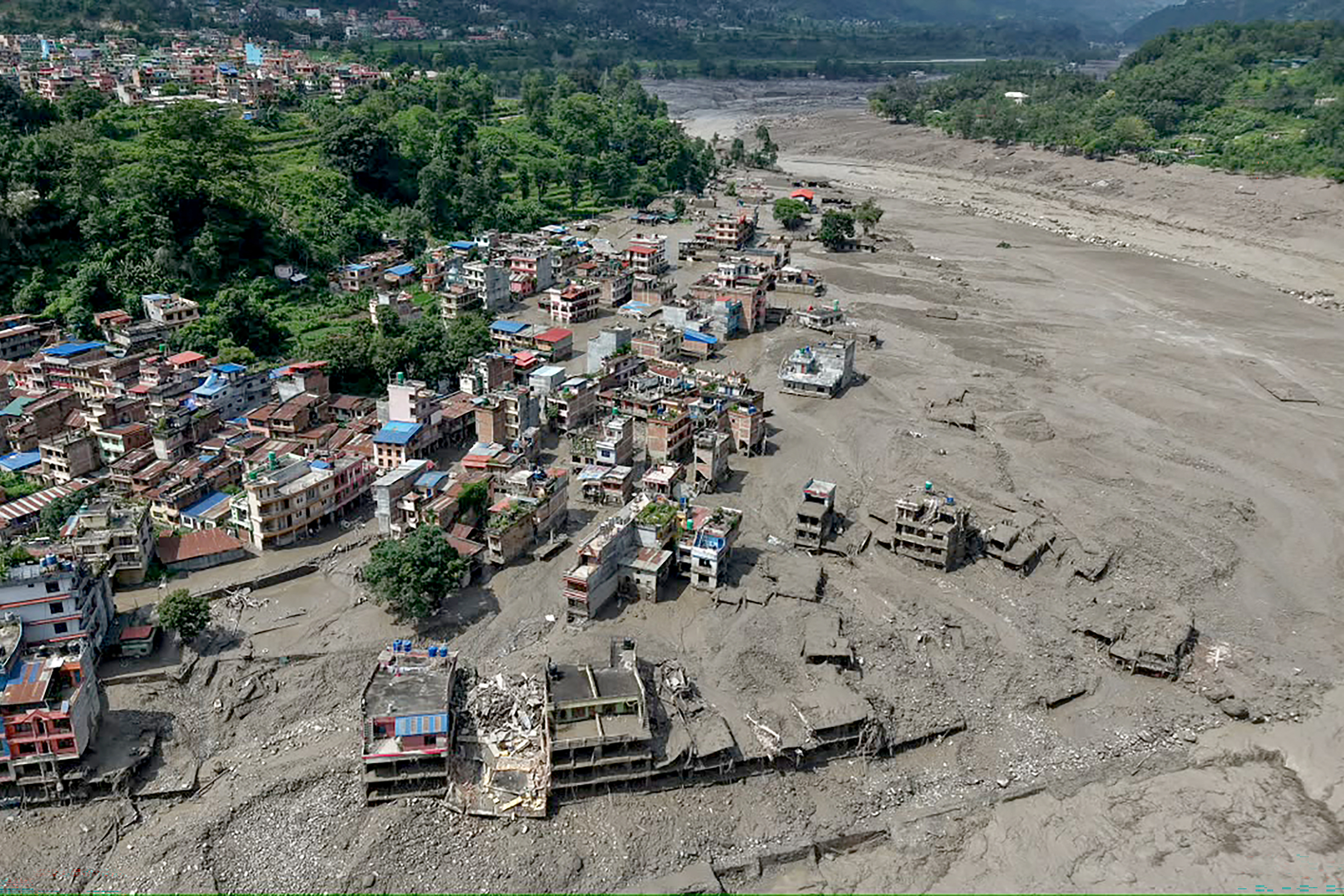 Torrential floods devastate Nepal, Tibet; nine dead, more missing