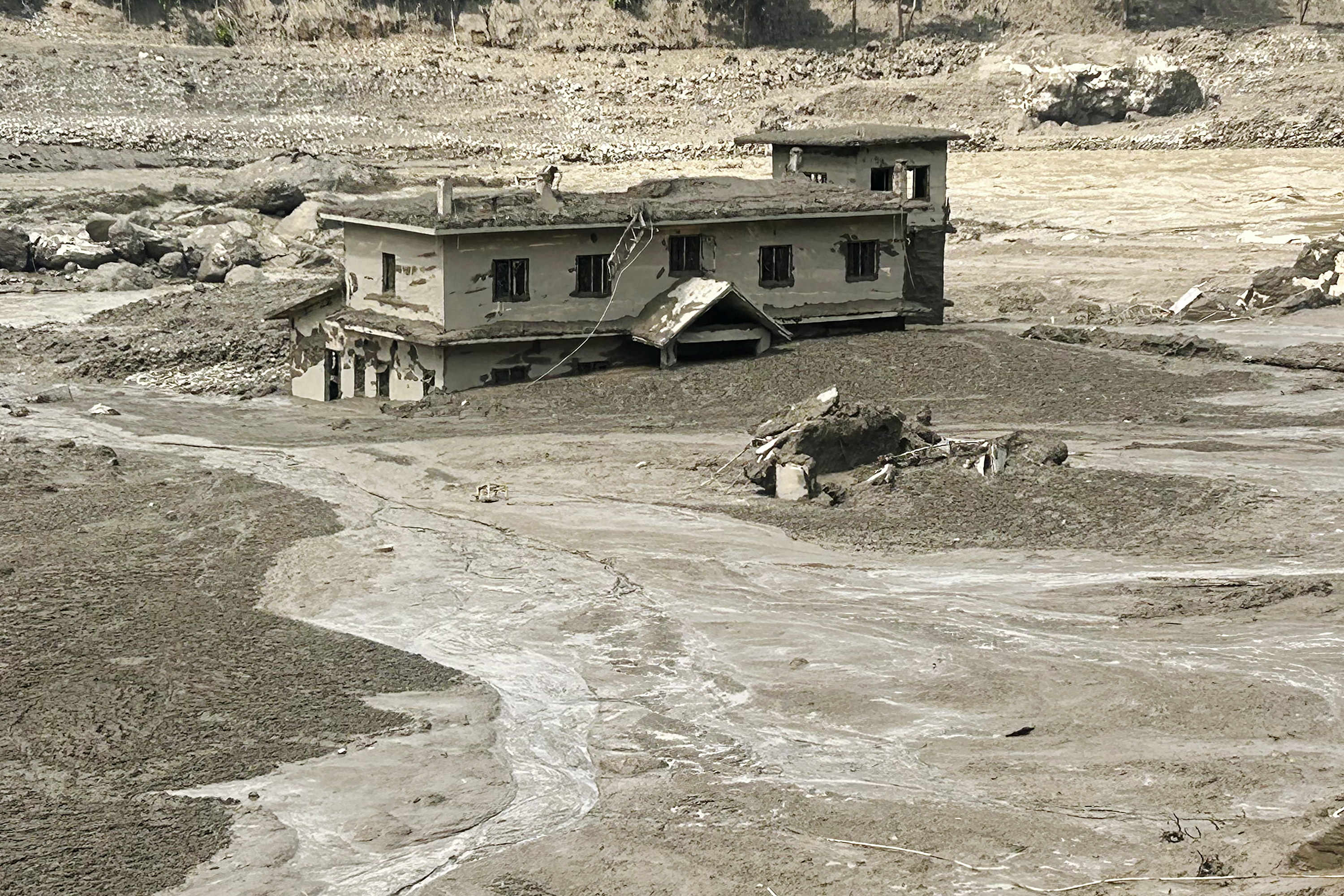 Torrential floods devastate Nepal, Tibet; nine dead, more missing