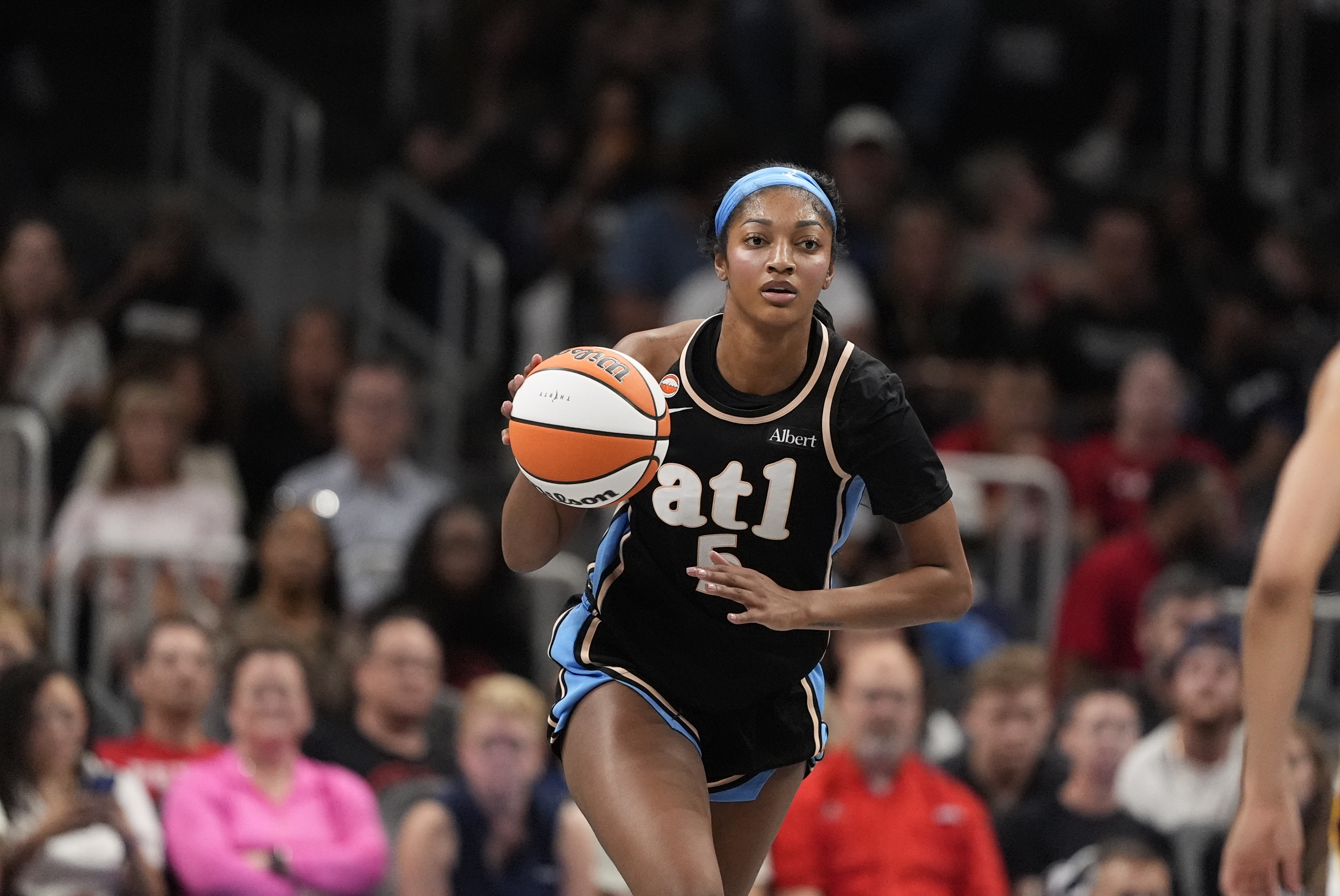 Atlanta Dream forward Angel Reese (5) in action.