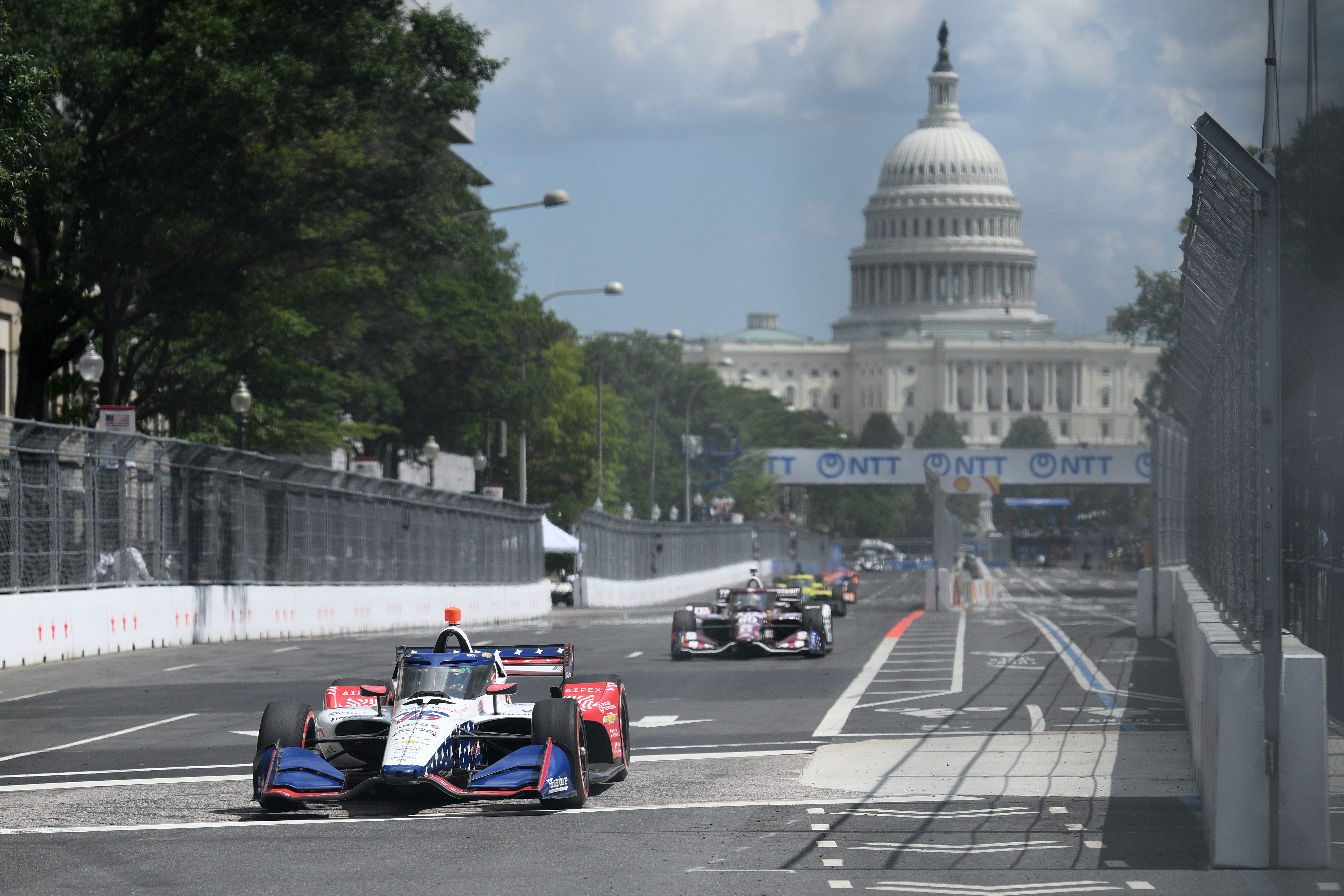 Race cars have roared through the streets of Washington, DC, in the shadow of iconic landmarks as the Freedom 250 Grand Prix, created by former US President Donald Trump, began with practice and qualifying for Sunday’s first-of-its-kind event. IndyCar drivers tested open-wheel cars at speeds of up to 185mph (298km/h) on Saturday over the bumps and bends of a seven-turn, 1.7-mile (2.7km) course that winds around the Washington Monument, the US Capitol, the National Gallery of Art and the Smithsonian National Air and Space Museum along the National Mall. Spain’s Alex Palou, the championship leader with six wins this season, claimed his seventh pole position of the campaign with a qualifying lap of 56.899 seconds after setting the fastest practice time of 56.614 seconds. But results took a back seat to the dramatic backdrop for Sunday’s race, which Trump established by executive order as part of celebrations marking the 250th anniversary of the United States. Organisers expect up to 100,000 people to attend the event, with Trump among those due to be present. Freedom 250 IndyCar Trump
