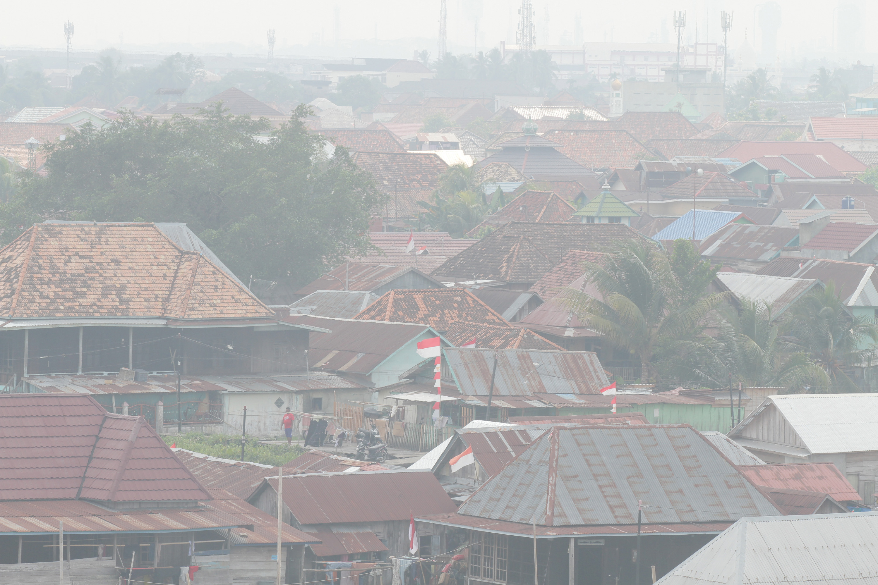 Indonesia battles haze as wildfires rage across South Sumatra forests