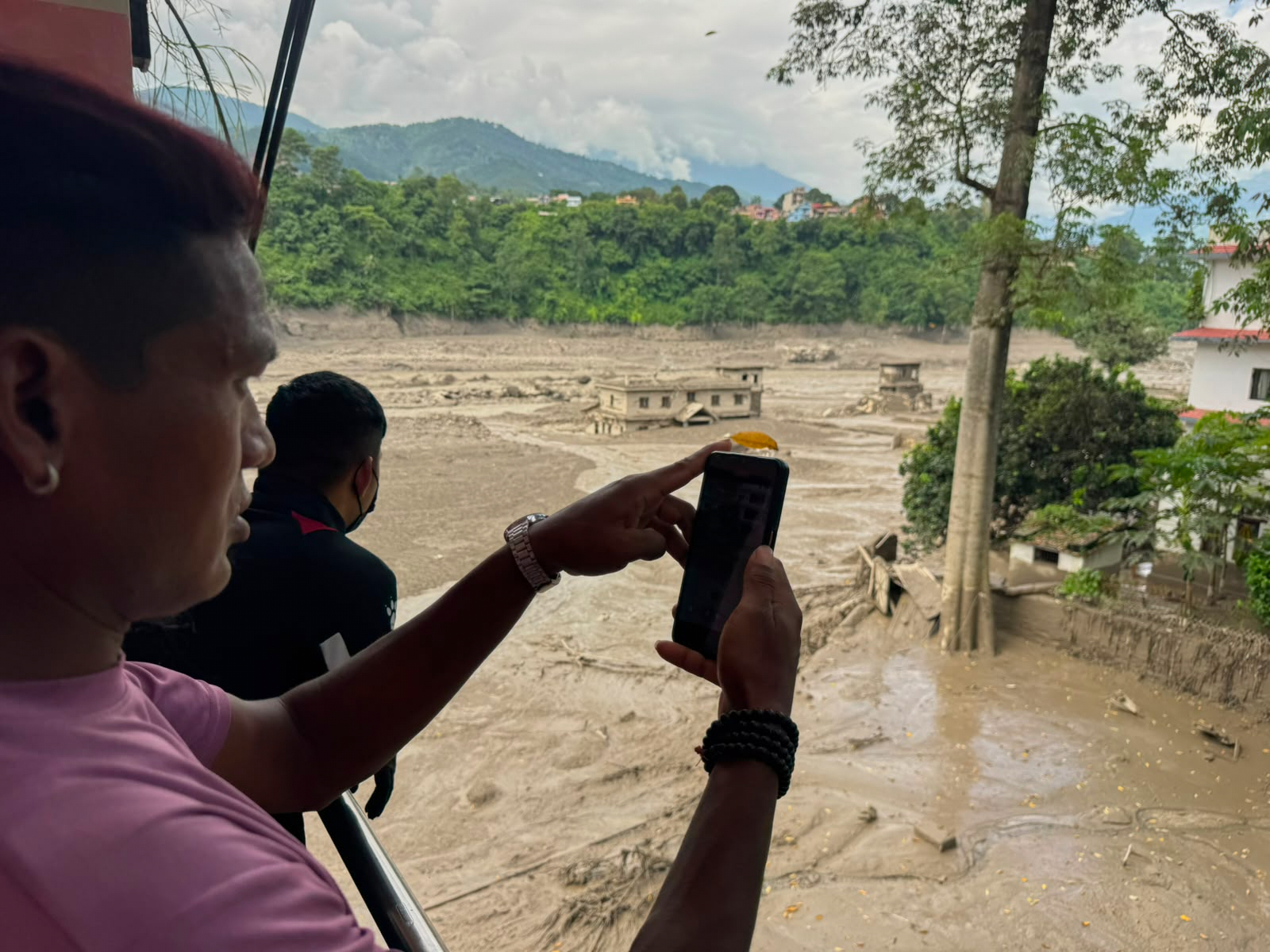 Torrential floods devastate Nepal, Tibet; nine dead, more missing