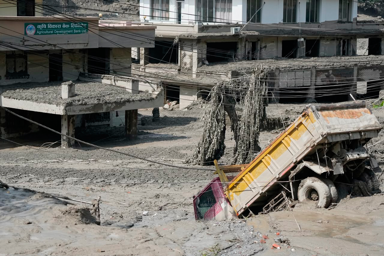 Torrential floods devastate Nepal, Tibet; nine dead, more missing