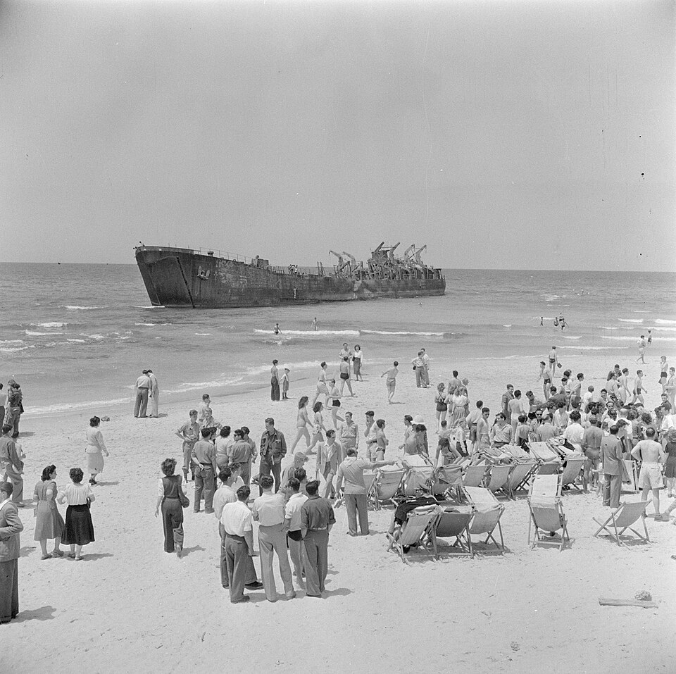 The burnt hull of the Altalena of the coast of Tel Aviv, Israel in 1948 [Willem van de Poll/Creative Commons/Wikipedia]