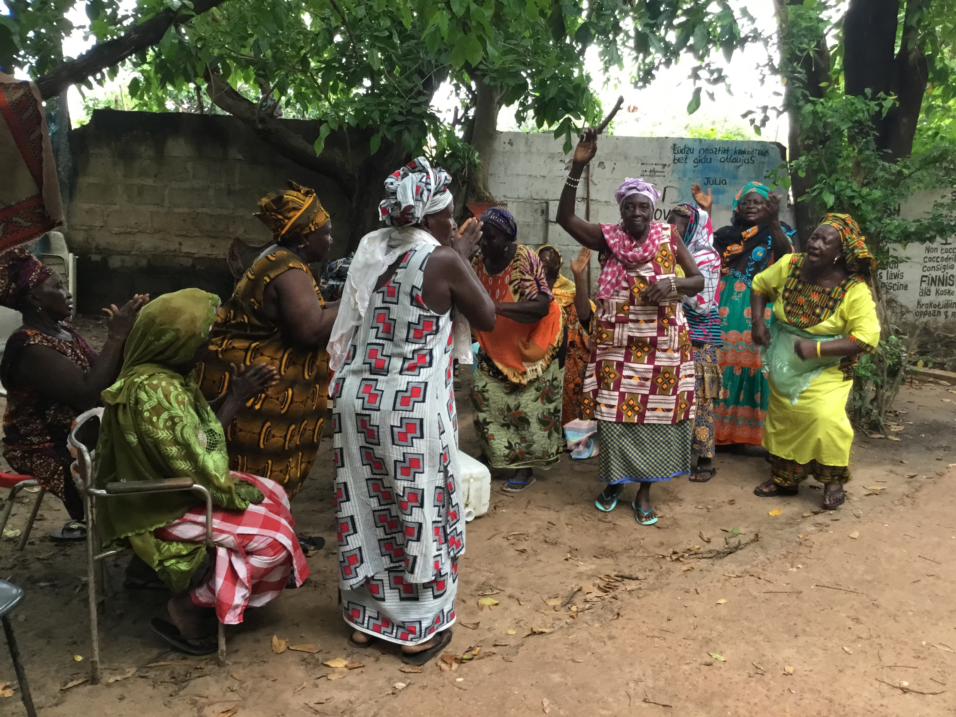 Kanyeleng women dance during a gathering in Bakau, keeping rhythm to songs passed down orally.