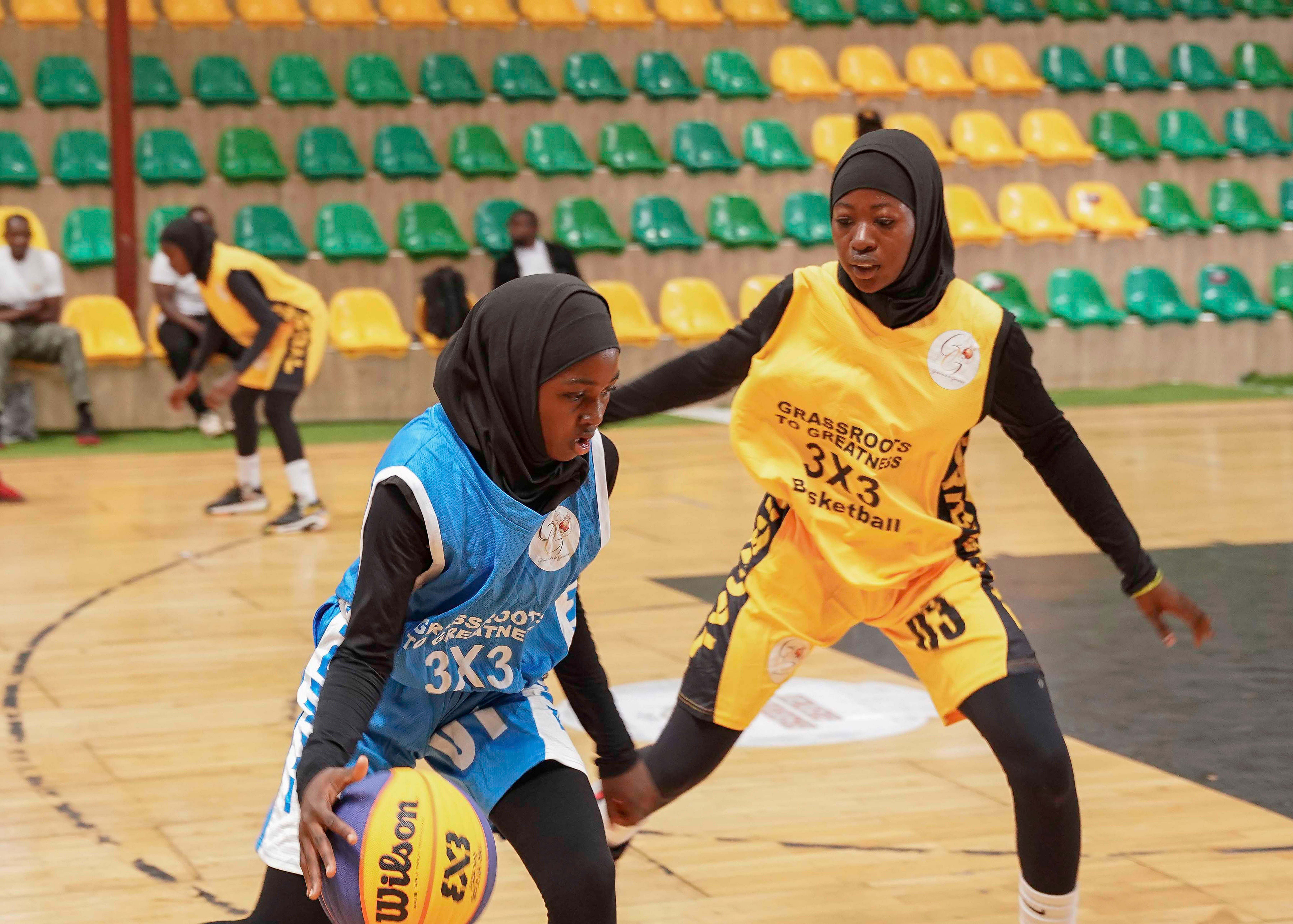 Girls take part in a basketball training session organised by Grassroots To Greatness (G2G), which provides young female players with opportunities to train and compete
