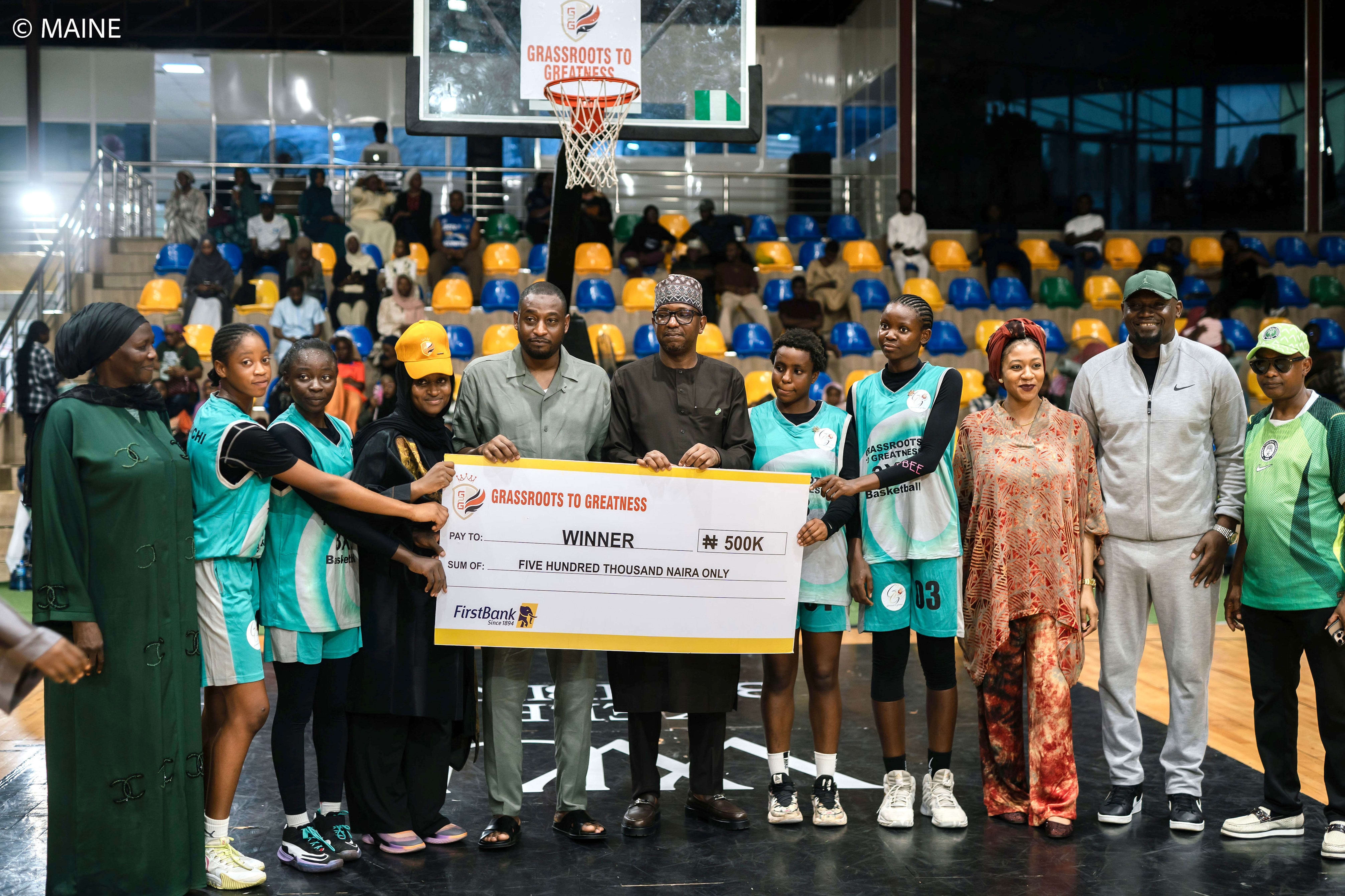 Some of the young female players receive financial support at the end of a tournament organised by Grassroots To Greatness [Grassroots To Greatness]