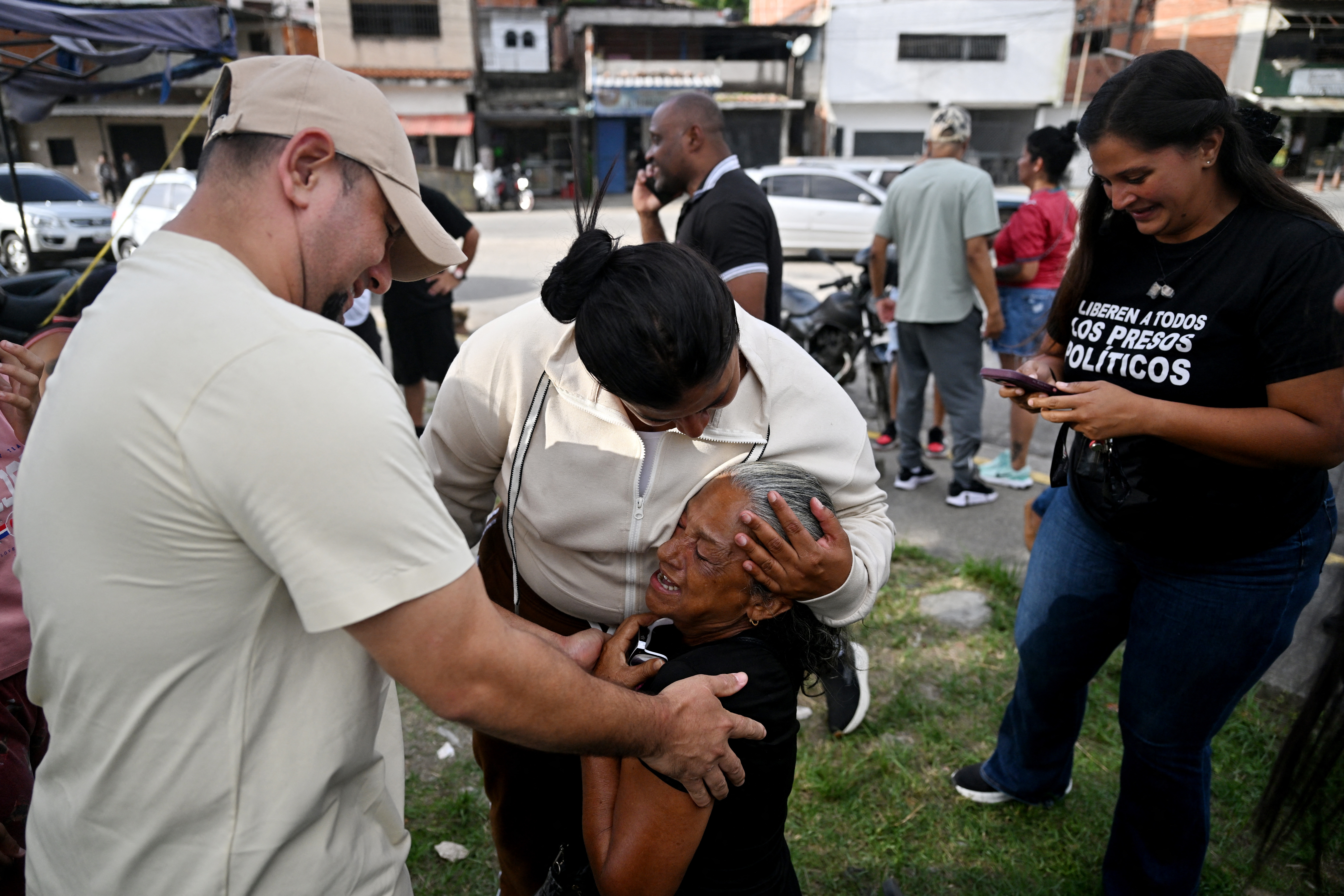 Relatives of political prisoners gather outside El Rodeo I prison ahead of the release of detainees in Guatire, Miranda state, Venezuela, on August 14, 2026 [AFP]