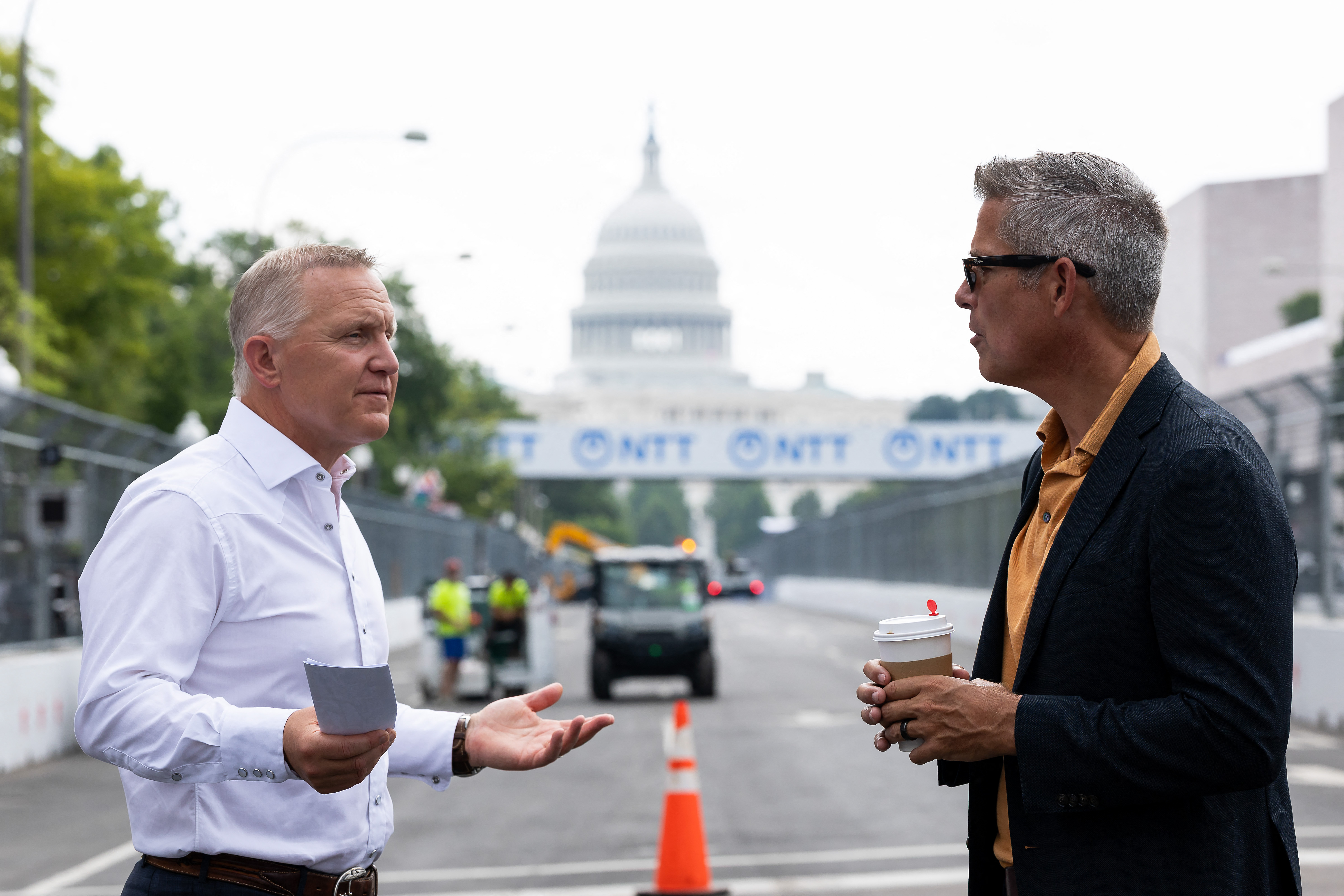 WASHINGTON, DC - AUGUST 20: CEO of Fox Sports Eric Shanks speaks with U.S. Secretary of Transportation Sean Duffy on the Freedom 250 Grand Prix track outside of the National Gallery of Art on August 20, 2026 in Washington, DC. Final preparations continue for the inaugural Freedom 250 Grand Prix, a two-day NTT IndyCar Series street race on August 22 and 23 past National Mall landmarks to celebrate America's 250th anniversary. Finn Gomez/Getty Images/AFP (Photo by Finn Gomez / GETTY IMAGES NORTH AMERICA / Getty Images via AFP)