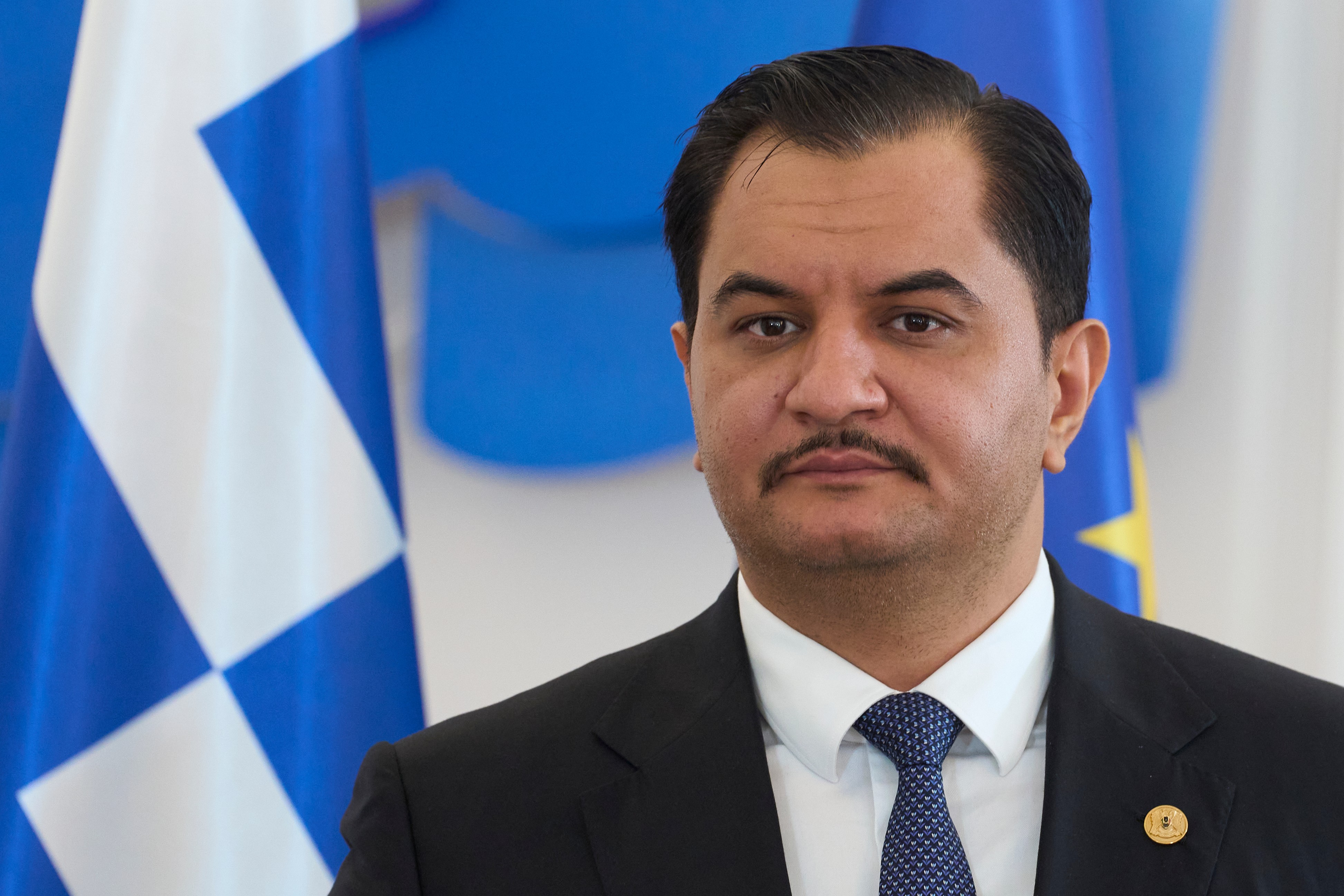 Deputy Commander of the Libyan National Army, Lieutenant General Saddam Haftar looks on before his meeting with the Greek Prime Minister Kyriakos Mitsotakis, in Athens, on Monday, June 15, 2026. (AP Photo/Petros Giannakouris)