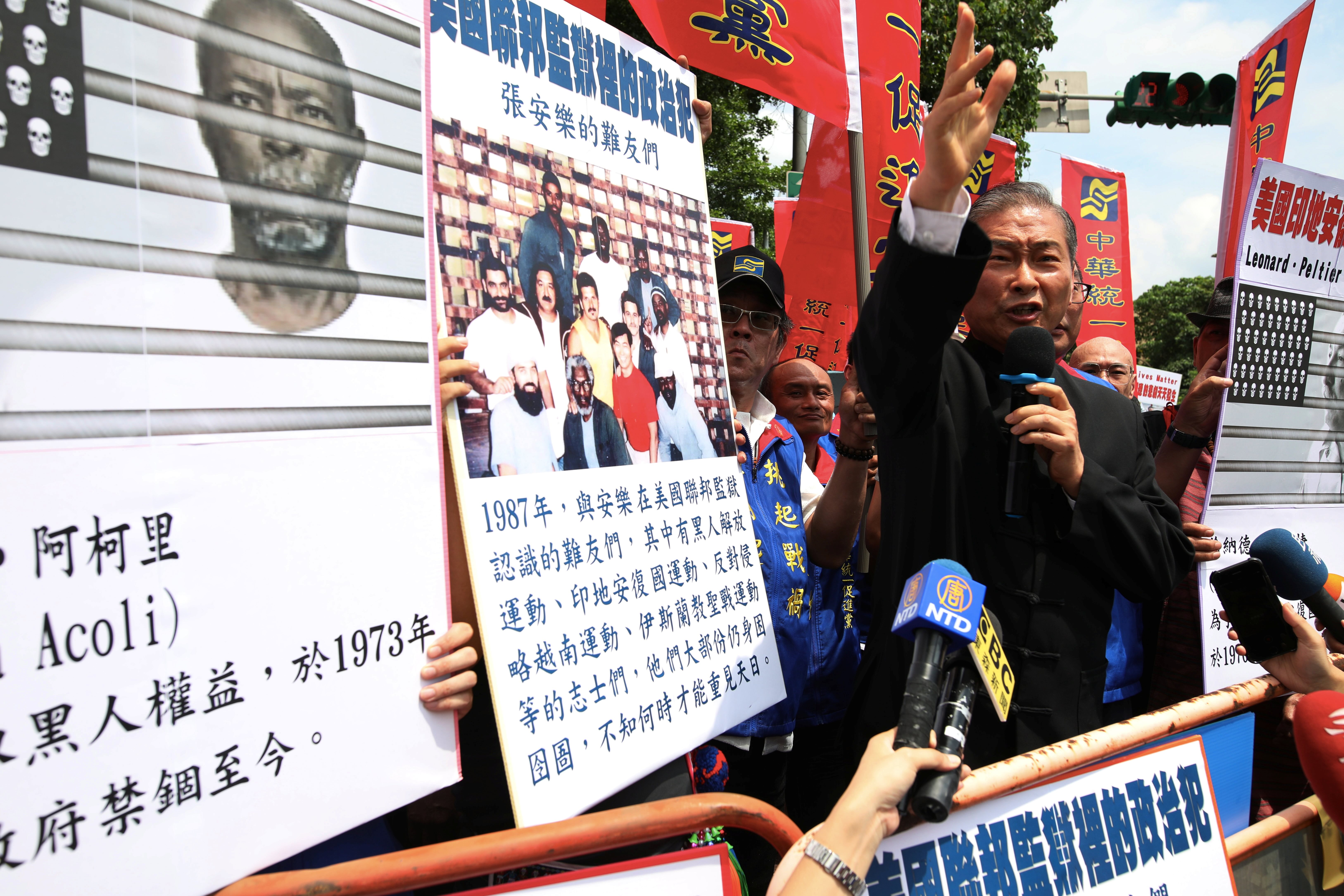 Chang An-lo, founder of the Chinese Unification Promotion Party, talks to the media during a rally against racism in Taipei, Taiwan, on June 12, 2020