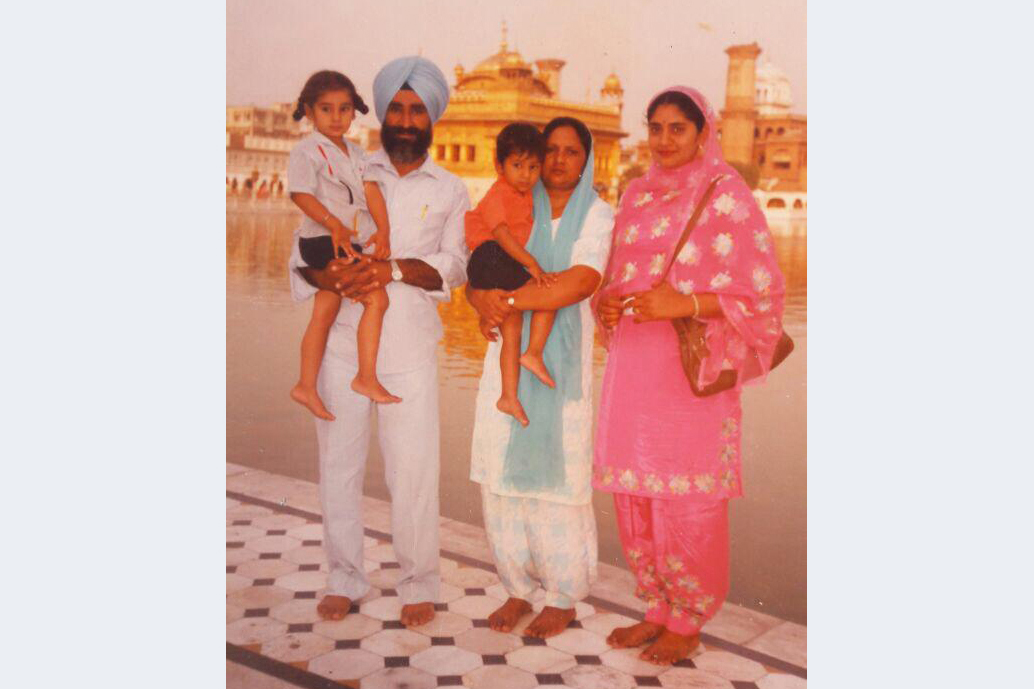 Jaswant Singh Khalra with his wife, children and a realtive outside the Golden Temple in Amritsar, Punjab, India [Courtesy of Khalra family]