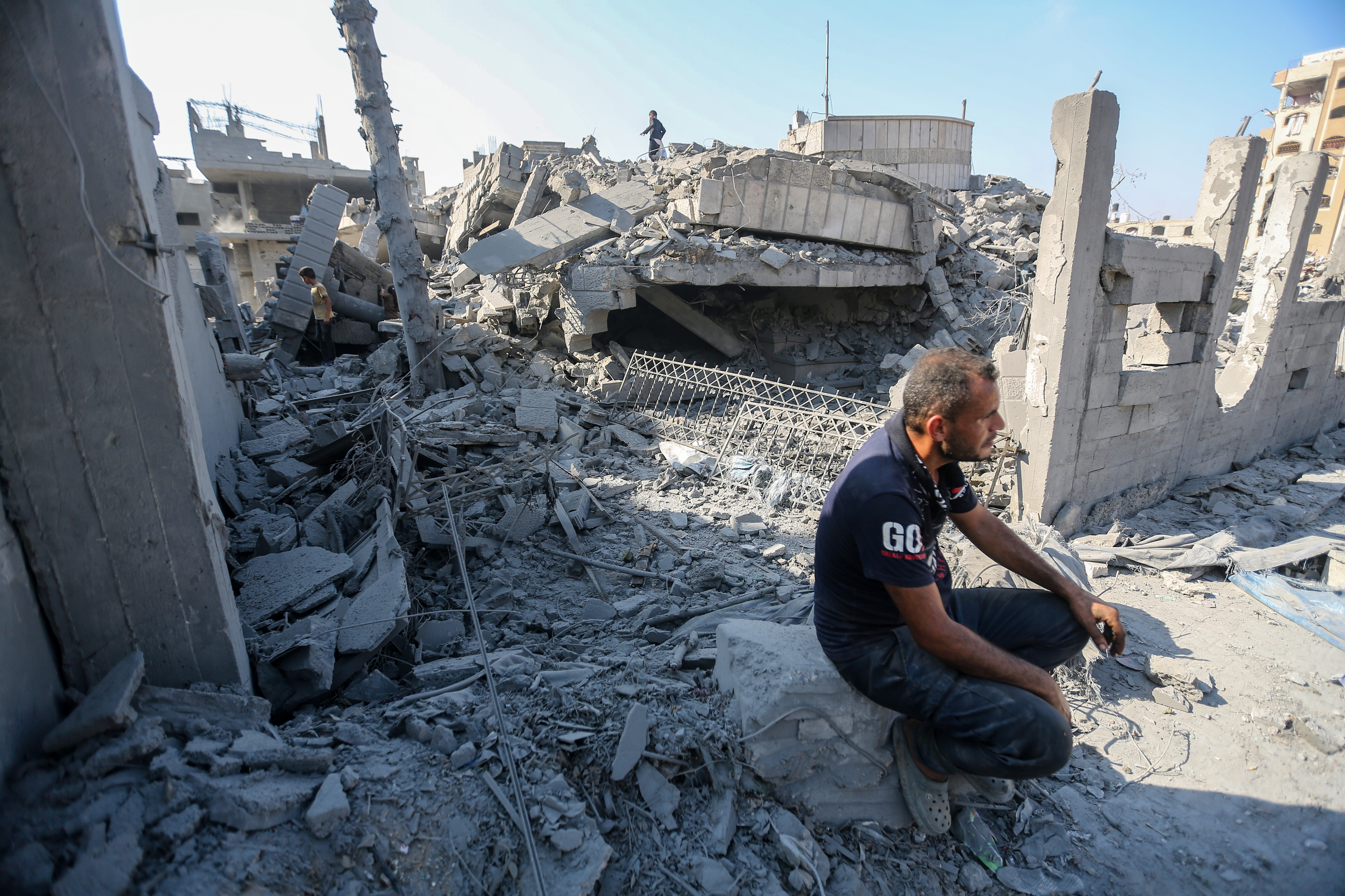 GAZA CITY, GAZA - AUGUST 1: Residents inspect the damage caused by Israeli airstrikes last night on residential buildings in the Safatawi area on August 1, 2026 in Gaza City, Gaza. Israel continues military actions in Gaza during the fragile easefire agreement which is frequently contested, and marred by mutual accusations of violations. (Photo by Ahmad Hasaballah/Getty Images)