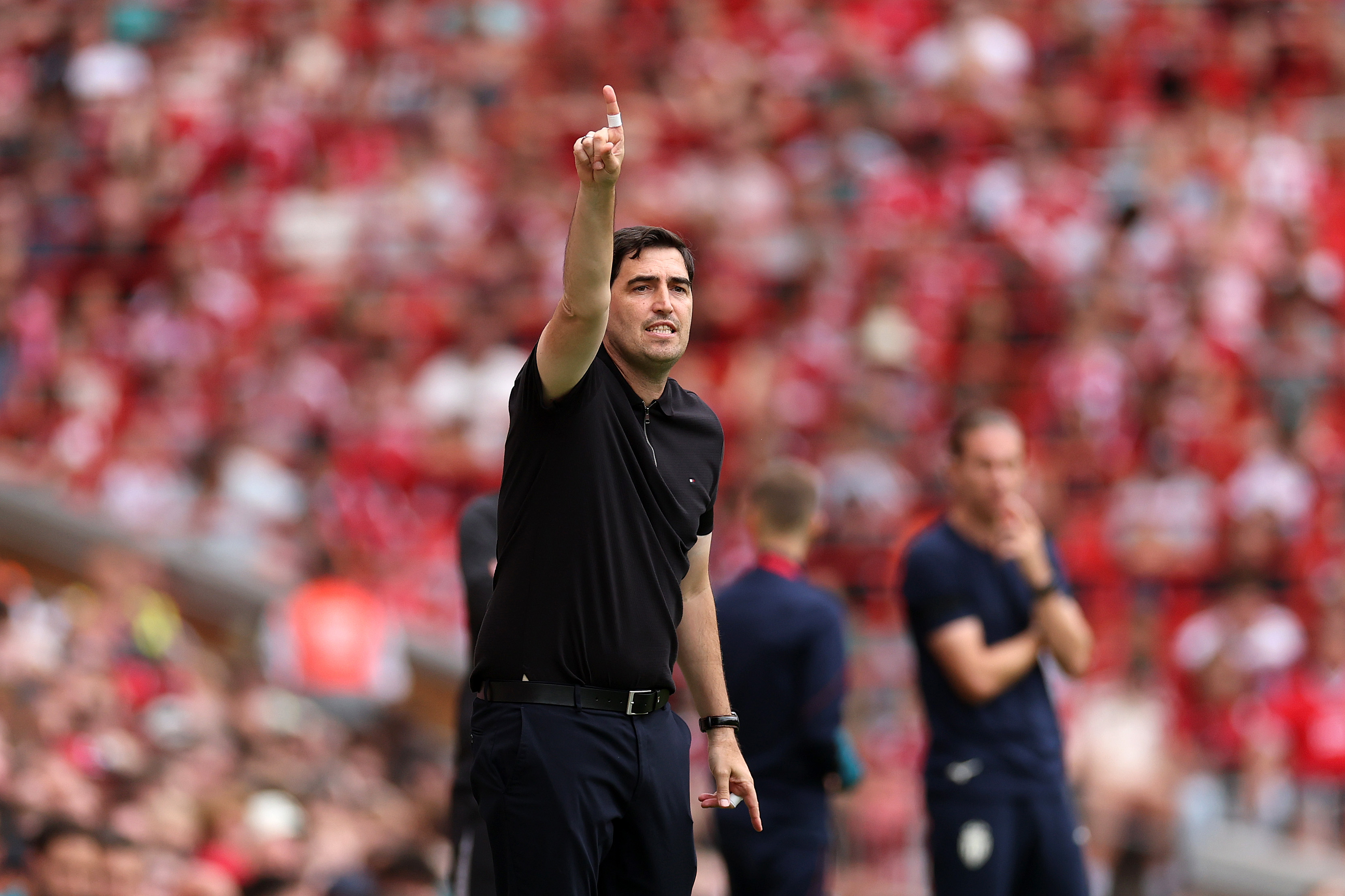 LIVERPOOL, ENGLAND - AUGUST 09: (THE SUN OUT, THE SUN ON SUNDAY OUT) Andoni Iraola, Manager of Liverpool, gives the team instructions during the pre-season friendly match between Liverpool FC and AS Monaco at Anfield on August 09, 2026 in Liverpool, England. (Photo by Jan Kruger/Getty Images)