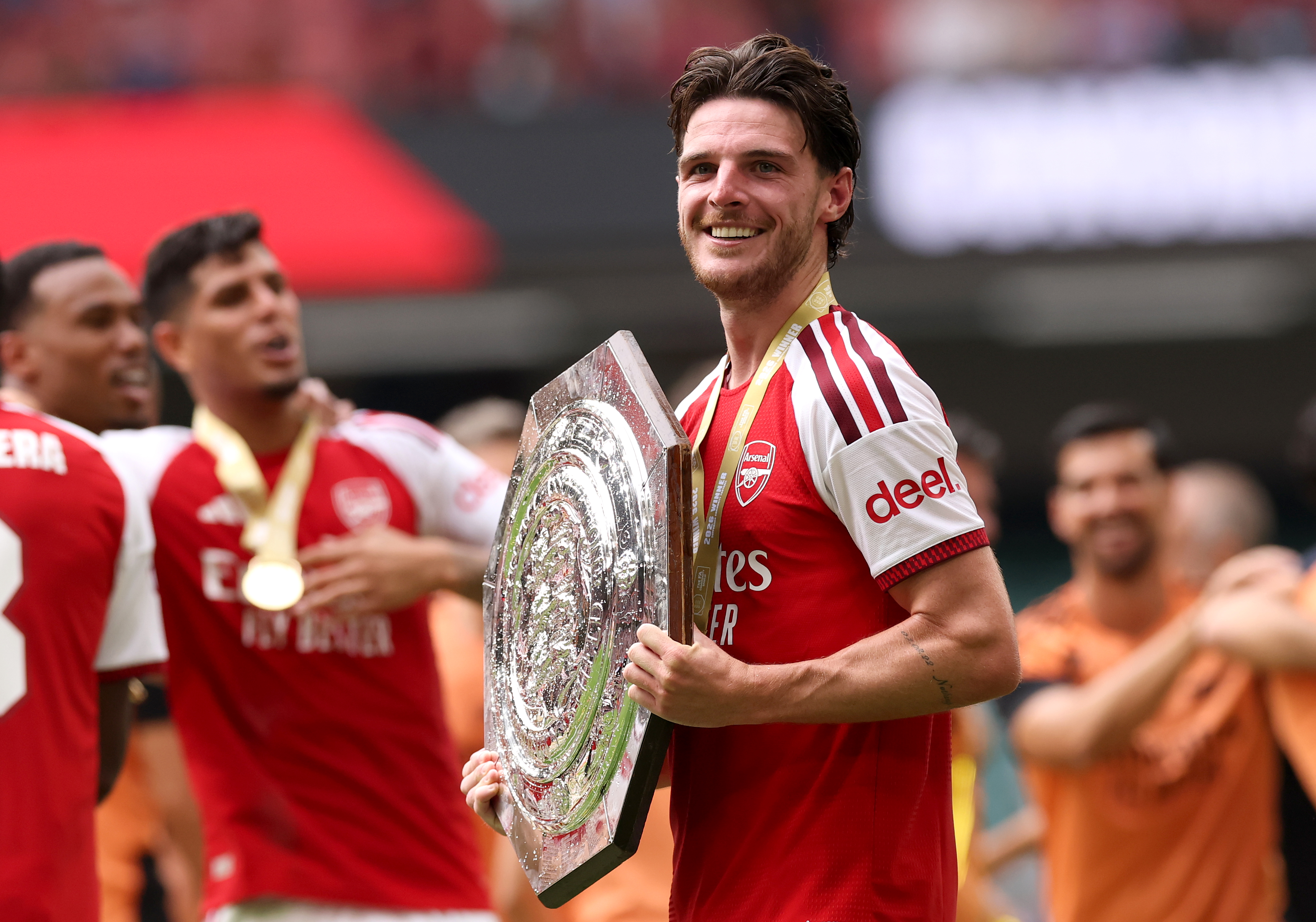 CARDIFF, WALES - AUGUST 16: Declan Rice of Arsenal holds the FA Community Shield trophy after his team’s victory in the 2026 FA Community Shield match between Arsenal and Manchester City at Principality Stadium on August 16, 2026 in Cardiff, Wales. (Photo by Carl Recine/Getty Images)