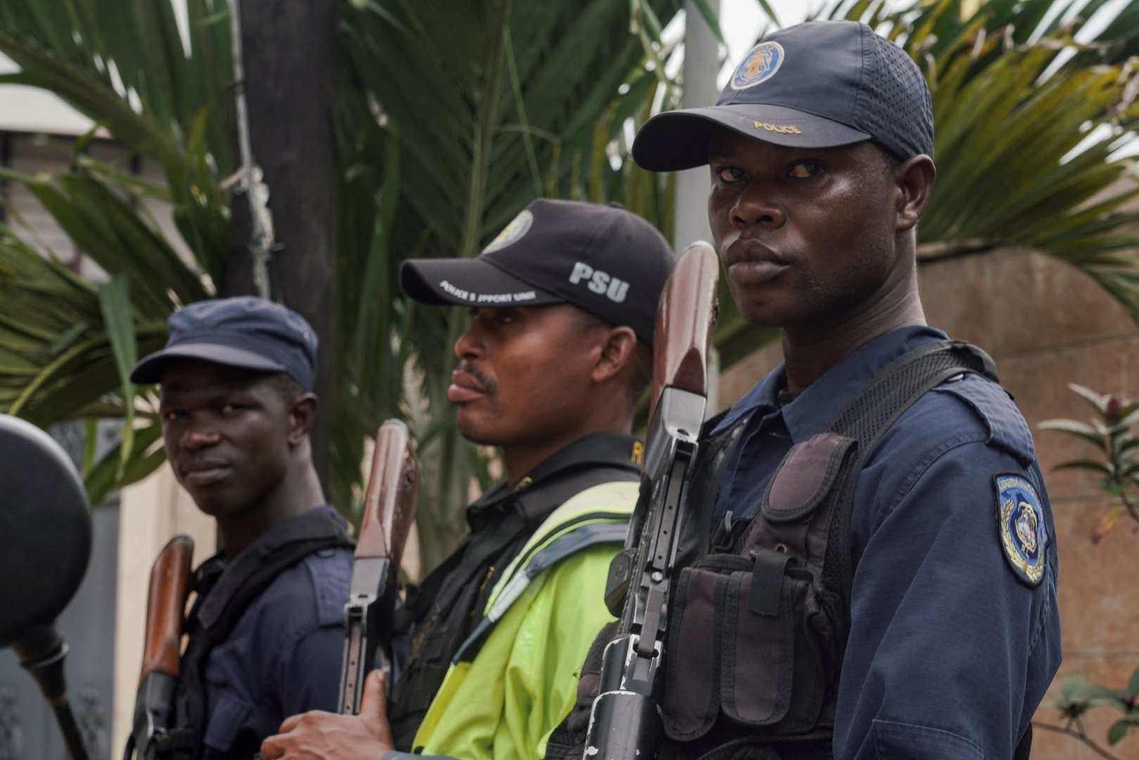 Security guards stand outside a building near Roberts International Airport as deportees from the United States arrive, in Harbel, near Monrovia, Liberia, August 20, 2026. [Carielle Doe/Reuters]