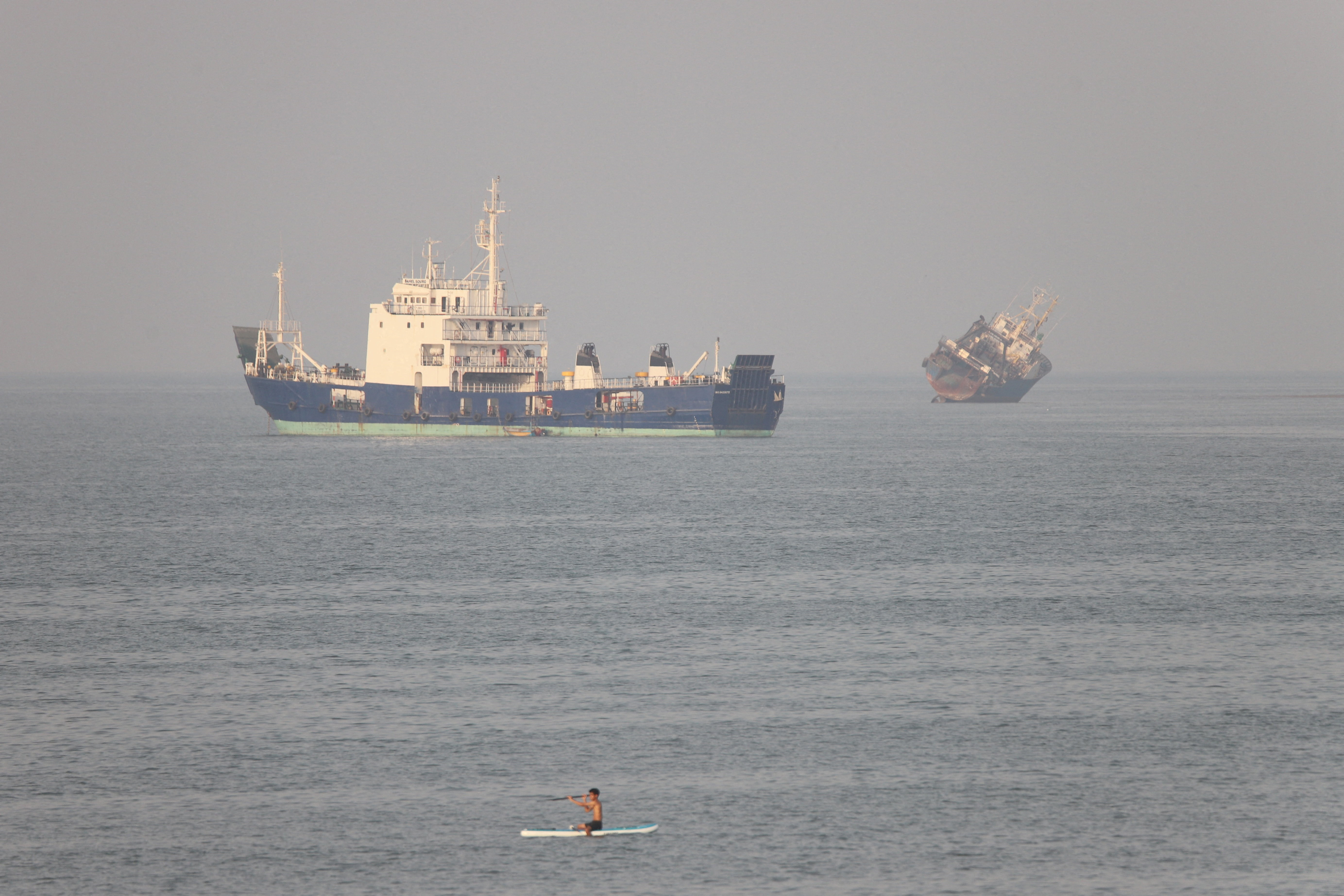 FILE PHOTO: Vessels in the Strait of Hormuz near the beach of Bandar Abbas, Iran, June 21, 2026. Amirhosein Khorgooi/ISNA/via WANA (West Asia News Agency)via REUTERS ATTENTION EDITORS - THIS PICTURE WAS PROVIDED BY A THIRD PARTY. ISRAEL OUT. NO COMMERCIAL OR EDITORIAL SALES IN ISRAEL. NO ACCESS FOR ISRAELI MEDIA. NO USE BBC PERSIAN. NO USE VOA PERSIAN. NO USE MANOTO. NO USE IRAN INTERNATIONAL. NO USE RADIO FARDA. DIGITAL: NO USE BBC PERSIAN. NO USE VOA PERSIAN. NO USE MANOTO. NO USE IRAN INTERNATIONAL. NO USE RADIO FARDA./File Photo
