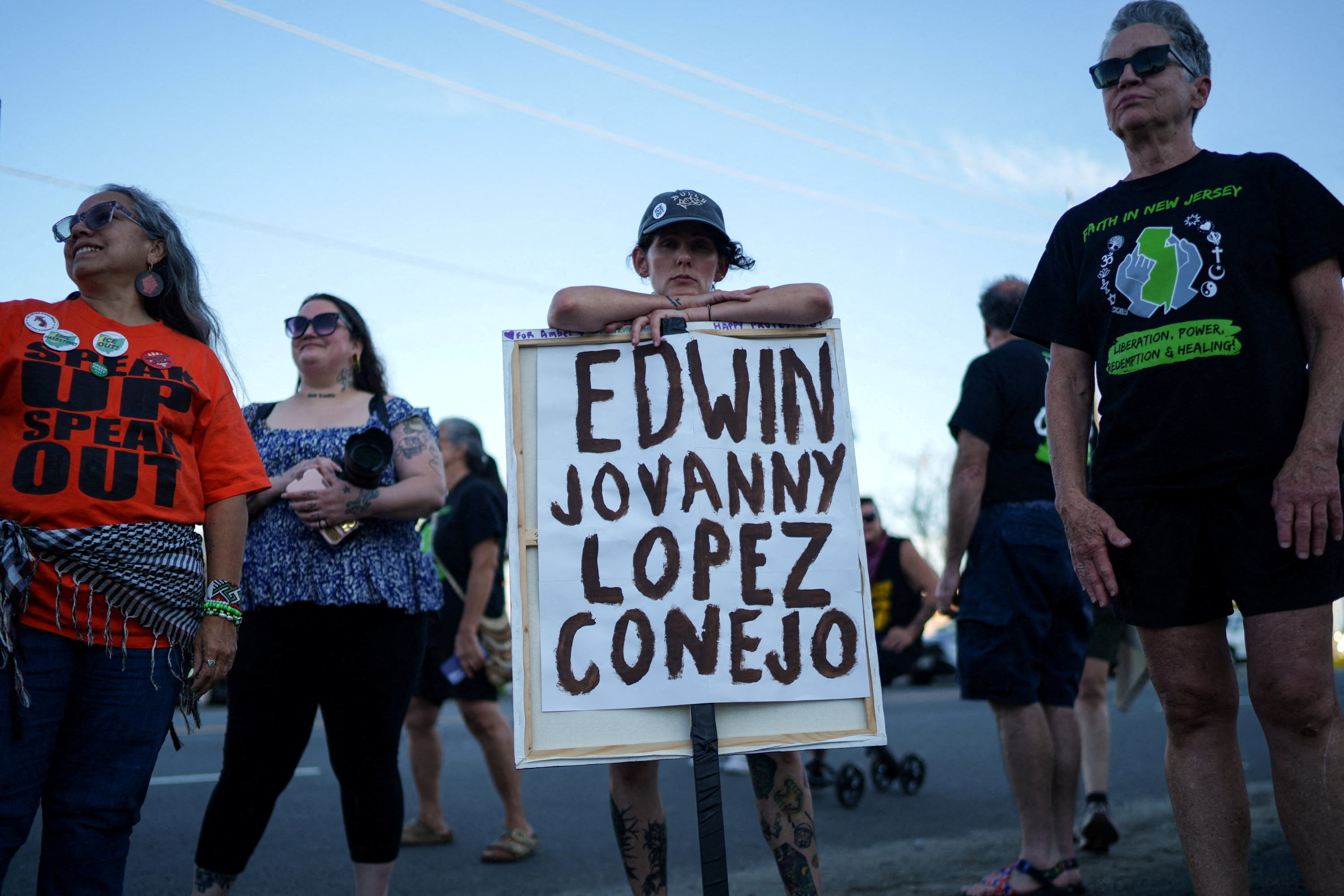 Protesters gather for a vigil outside of Delaney Hall detention center, for a Salvadoran immigrant who was being held inside, Edwin Lopez-Cornejo, died on Saturday, in Newark, New Jersey, U.S., August 3, 2026. REUTERS/Ryan Murphy REFILE - CORRECTING SURNAME FROM "LOPEZ-CONEJO" TO "LOPEZ-CORNEJO".