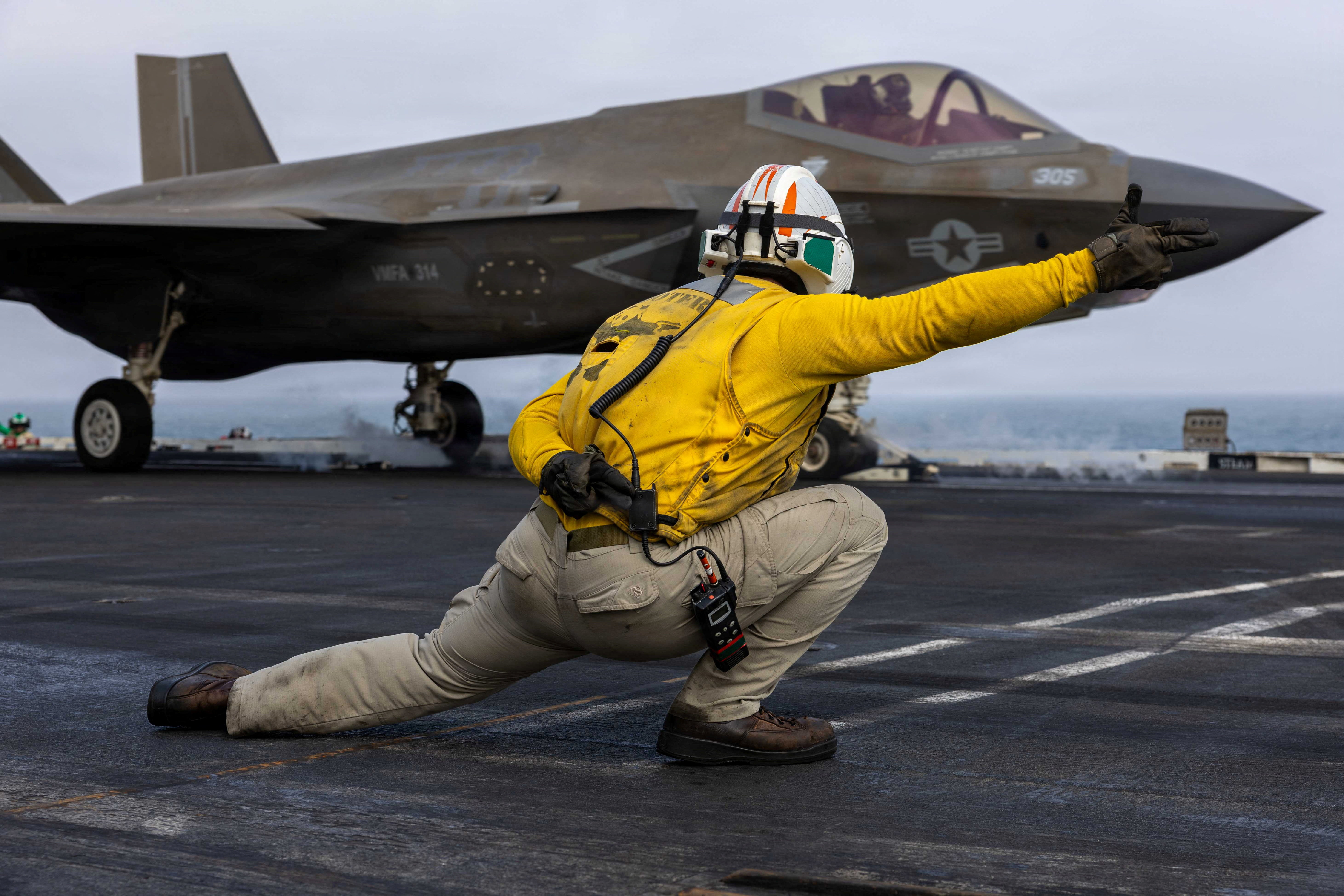 A U.S. sailor launches an F-35C Lightning II, assigned to Marine Fighter Attack Squadron 314, from the flight deck of Nimitz-class aircraft carrier USS Abraham Lincoln during the ongoing conflict with Iran August 5, 2026. U.S. Navy/Handout via REUTERS THIS IMAGE HAS BEEN SUPPLIED BY A THIRD PARTY.