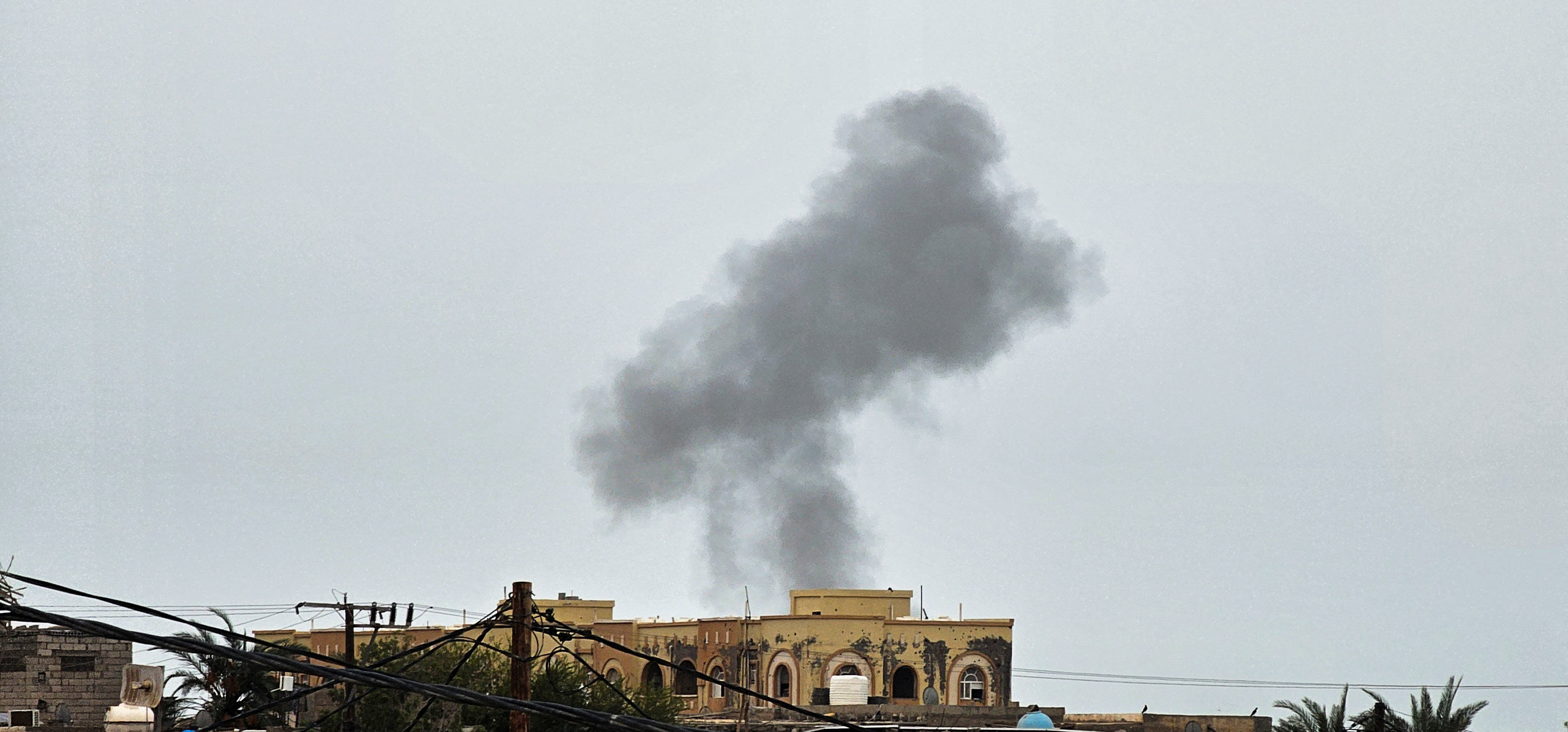 Smoke rises during Houthi missile and drone strikes on the Red Sea port city of Mocha, Yemen, August 9, 2026. Picture taken with a mobile phone. REUTERS/Stringer