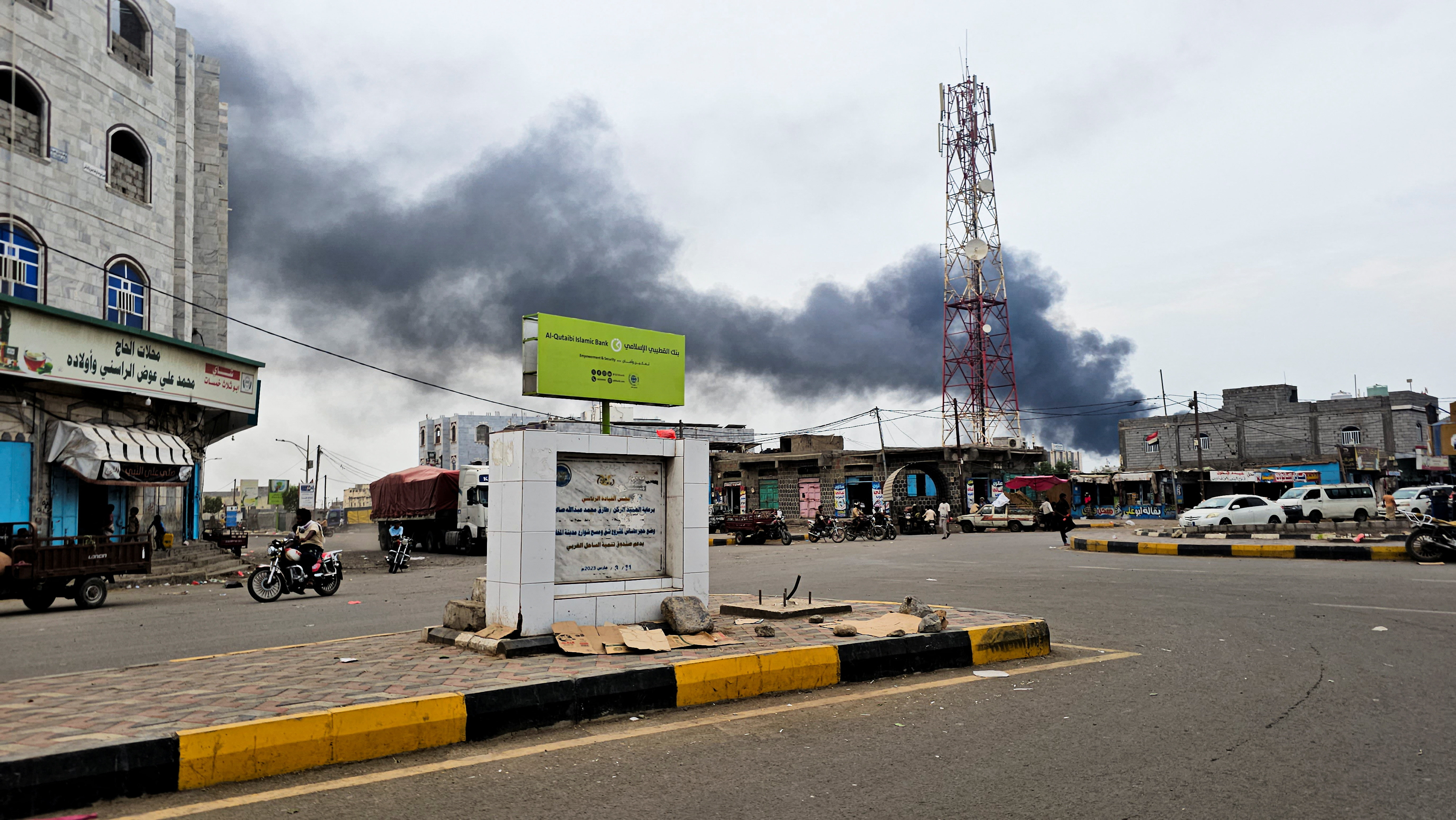 Smoke rises from the site of Houthi missile and drone strikes on the Red Sea port city of al-Makha (Mocha), Yemen [Reuters]