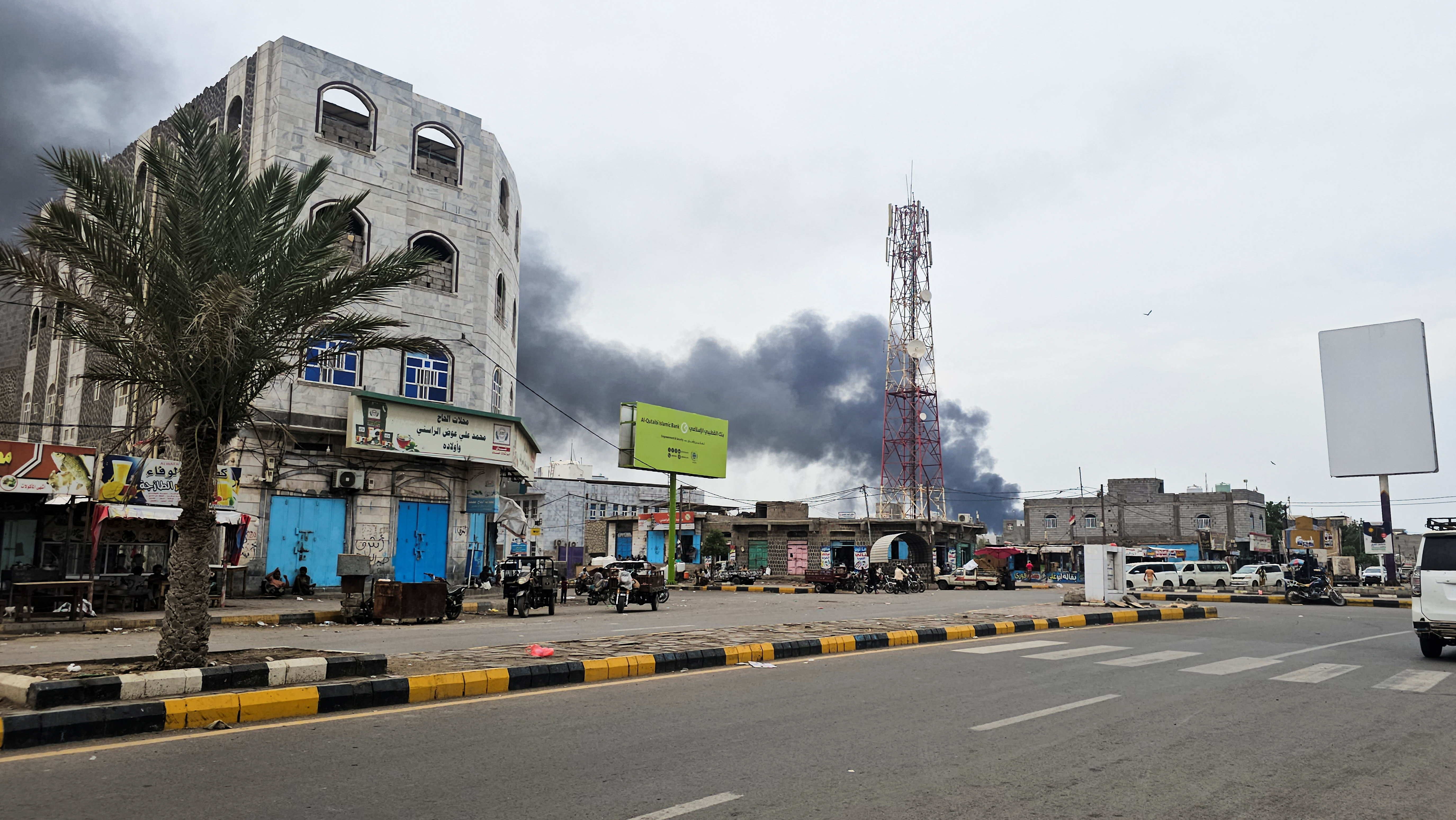 Smoke rises during Houthi missile and drone strikes on the Red Sea port city of Mocha, Yemen, August 9, 2026. Picture taken with a mobile phone. REUTERS/Stringer