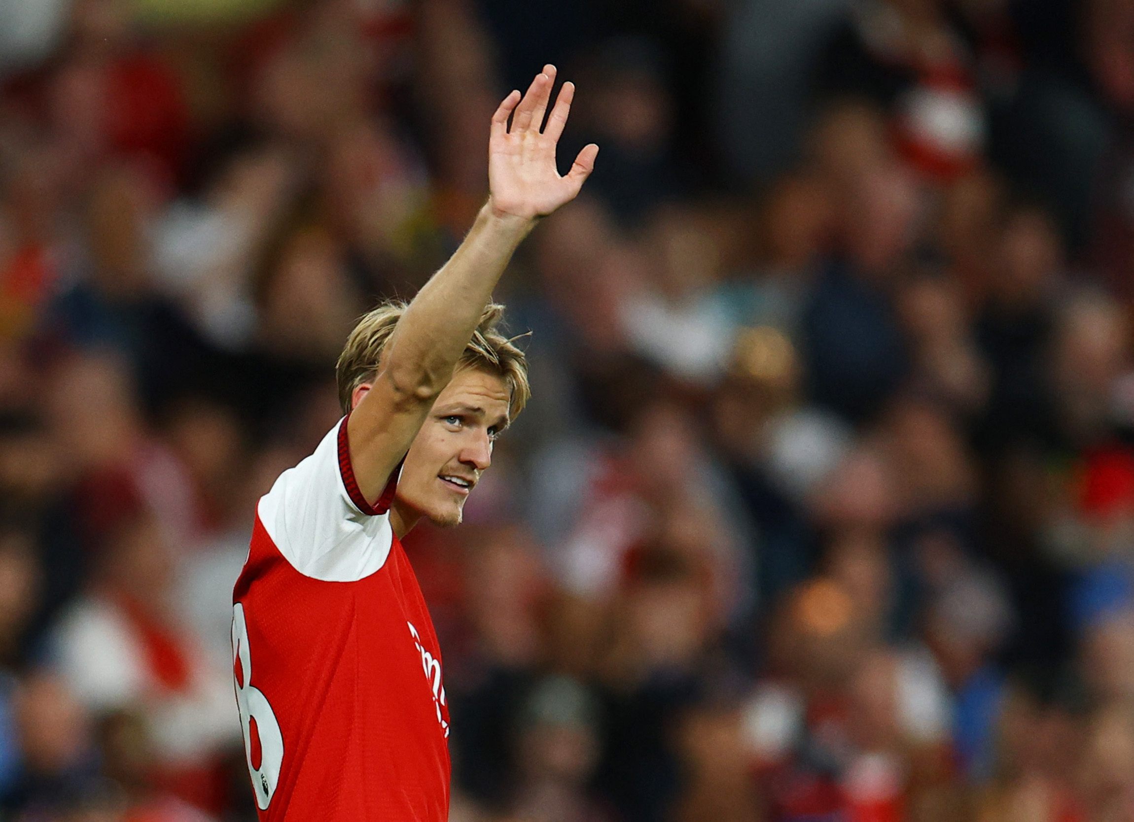 Soccer Football - Premier League - Arsenal v Coventry City - Emirates Stadium, London, Britain - August 21, 2026 Arsenal's Martin Odegaard celebrates scoring their third goal Action Images via Reuters/Peter Cziborra EDITORIAL USE ONLY. NO USE WITH UNAUTHORIZED AUDIO, VIDEO, DATA, FIXTURE LISTS, CLUB/LEAGUE LOGOS OR 'LIVE' SERVICES. ONLINE IN-MATCH USE LIMITED TO 120 IMAGES, NO VIDEO EMULATION. NO USE IN BETTING, GAMES OR SINGLE CLUB/LEAGUE/PLAYER PUBLICATIONS. PLEASE CONTACT YOUR ACCOUNT REPRESENTATIVE FOR FURTHER DETAILS..
