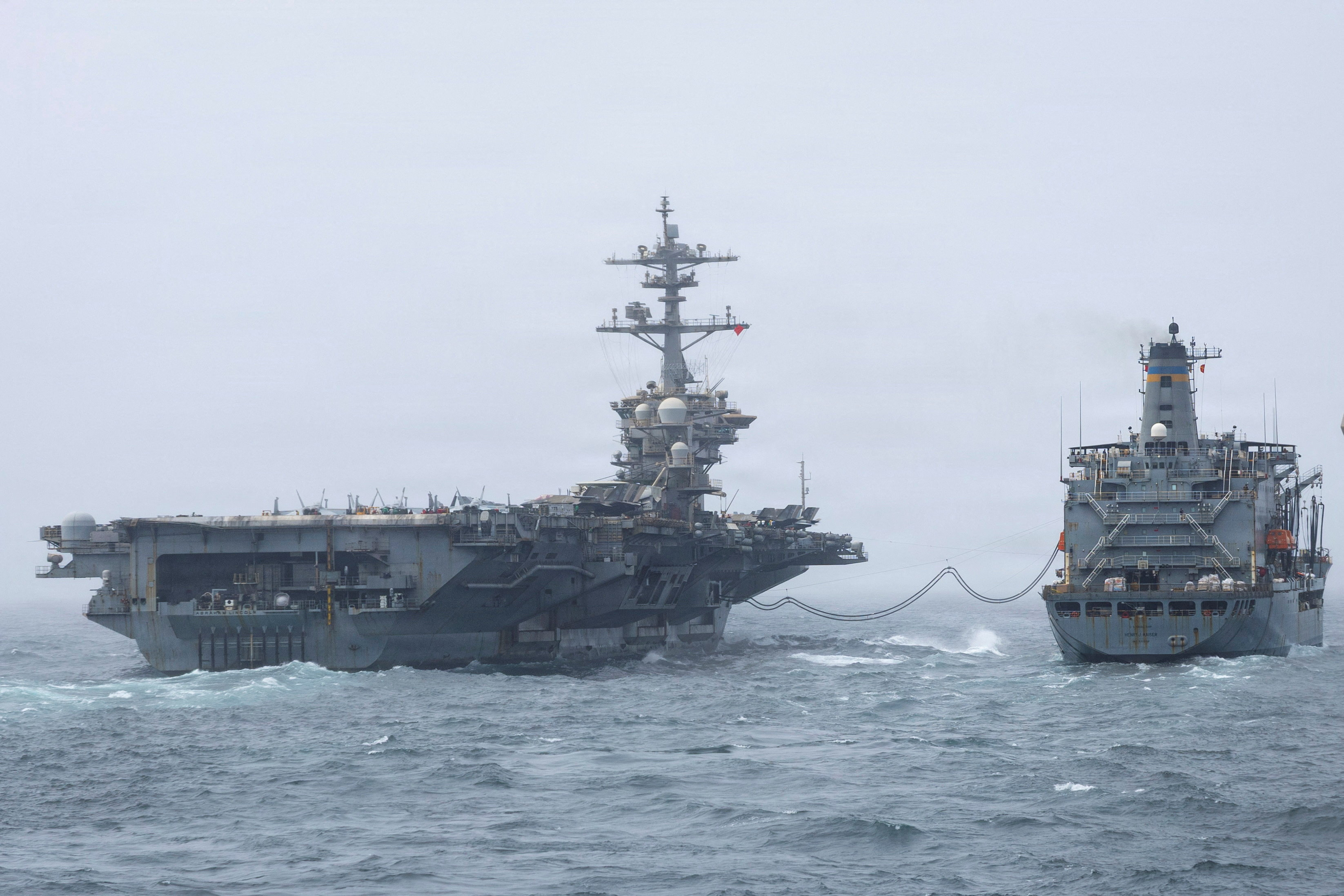 The U.S. Navy Nimitz-class aircraft carrier USS Abraham Lincoln, which is supporting U.S. military operations in the war with Iran, conducts a replenishment-at-sea with fleet replenishment oiler USNS Henry J. Kaiser, August 16, 2026. U.S. Navy/Handout via REUTERS. THIS IMAGE HAS BEEN SUPPLIED BY A THIRD PARTY
