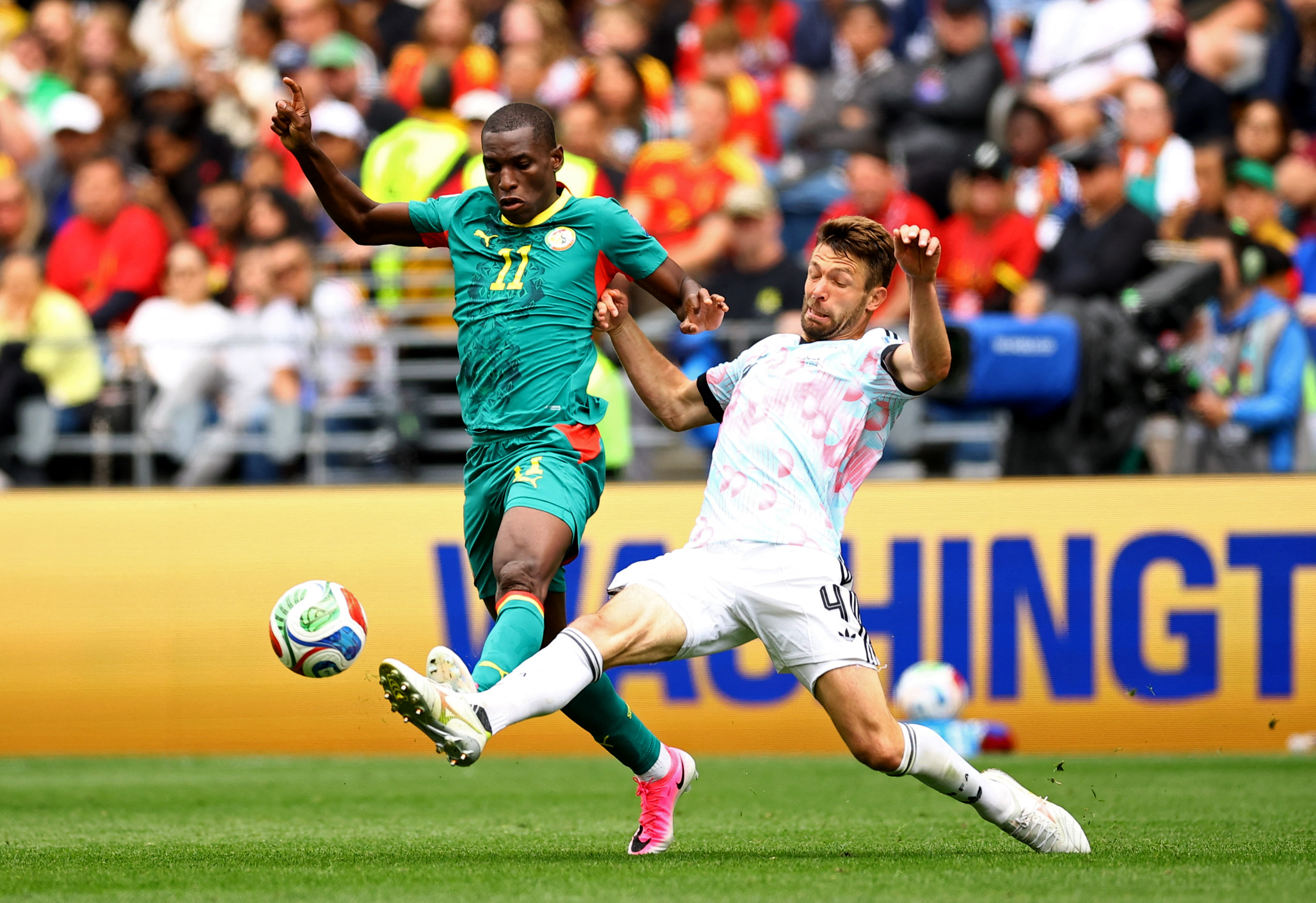 Senegal's Nicolas Jackson in action with Belgium's Brandon Mechele.