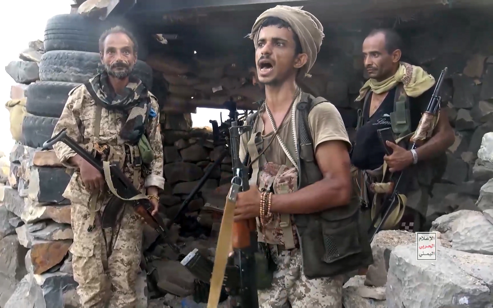epa13237566 A screen grab taken from an undated handout video released on 13 September 2026 by the Houthi military media center shows Houthi fighters standing guard at a seized camp during an offensive in the port city of Mokha, western coast of Yemen. Yemen's Saudi-backed government accused Iran and its regional allies of supporting the Houthis recent offensive, during which the group captured key port areas, including Mokha, and seized control of strategic maritime positions along the Bab al-Mandab Strait. EPA/HOUTHI MILITARY MEDIA CENTER HANDOUT HANDOUT EDITORIAL USE ONLY/NO SALES