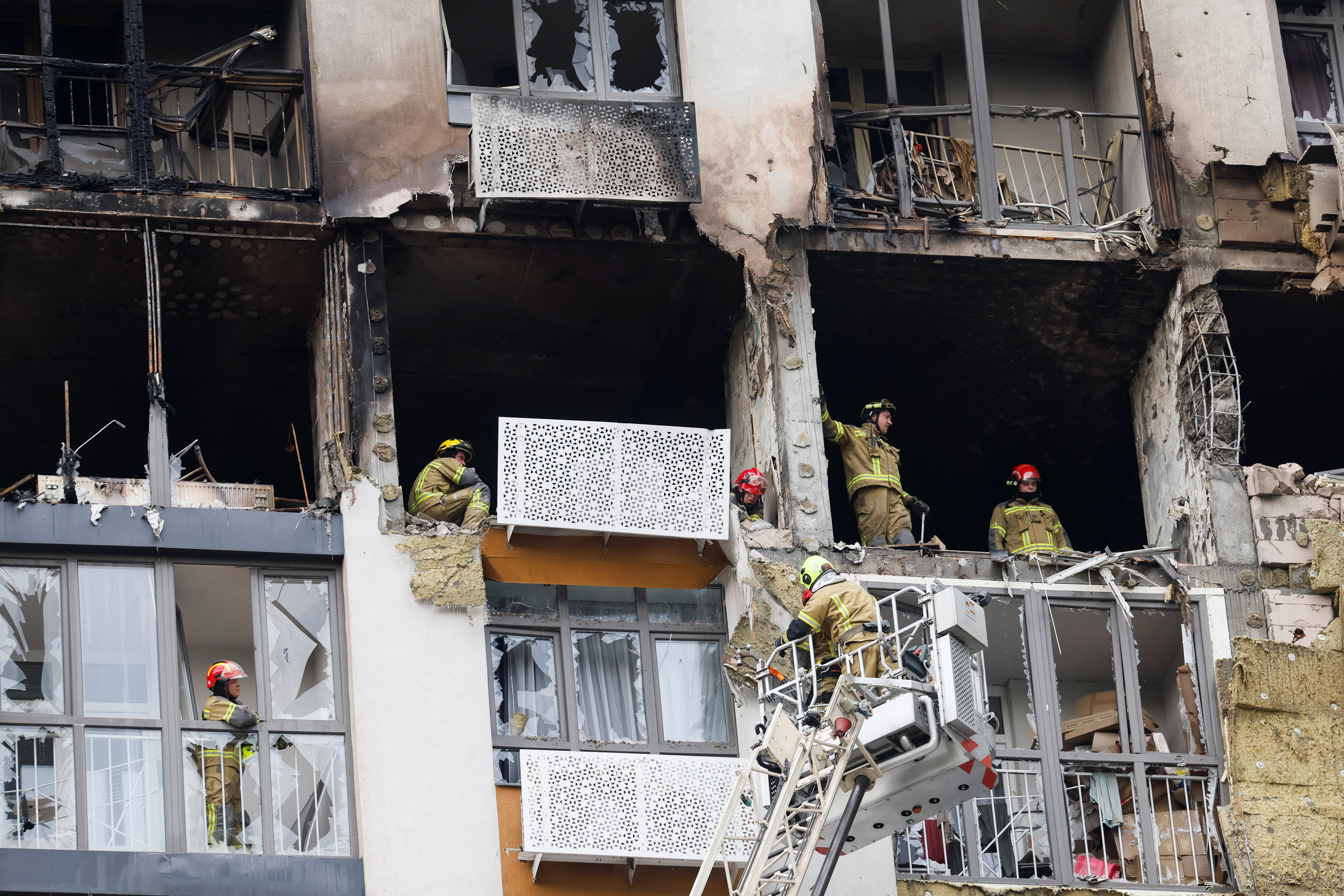 Firefighters work at the site of an apartment building damaged by a Russian drone strike, amid Russia’s attack on Ukraine, in Kyiv, Ukraine, on September 1