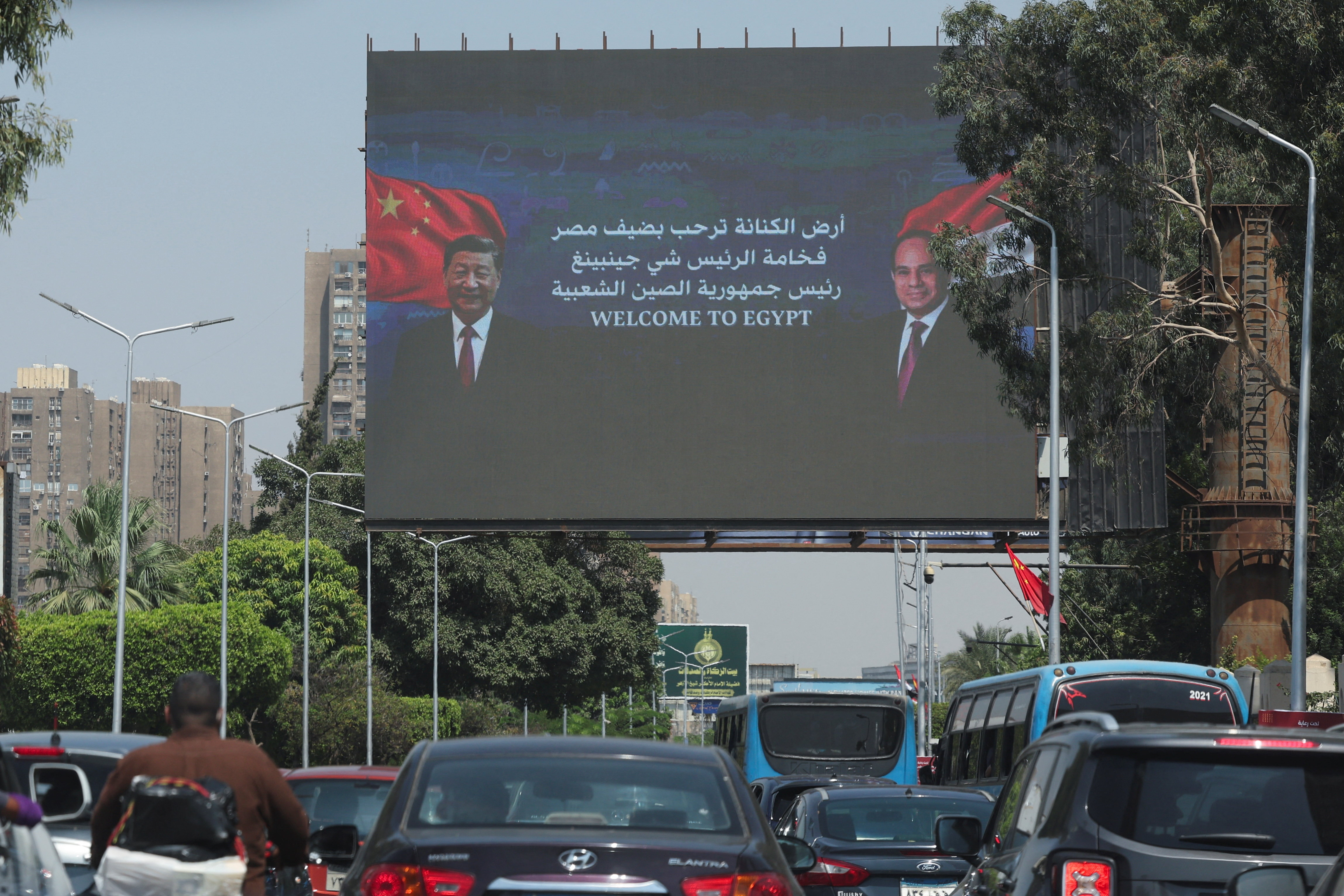 A screen displays images of Chinese President Xi Jinping and Egyptian President Abdel Fattah al-Sisi, along with a message reading in Arabic,"The Egyptian-Chinese friendship welcomes Egypt's guest, His Excellency President Xi Jinping, President of the People's Republic of China," ahead of Xi's state visit to Egypt, which will be his first state visit to the country in 10 years, in Cairo, Egypt, September 1, 2026. REUTERS/Mohamed Abd El Ghany