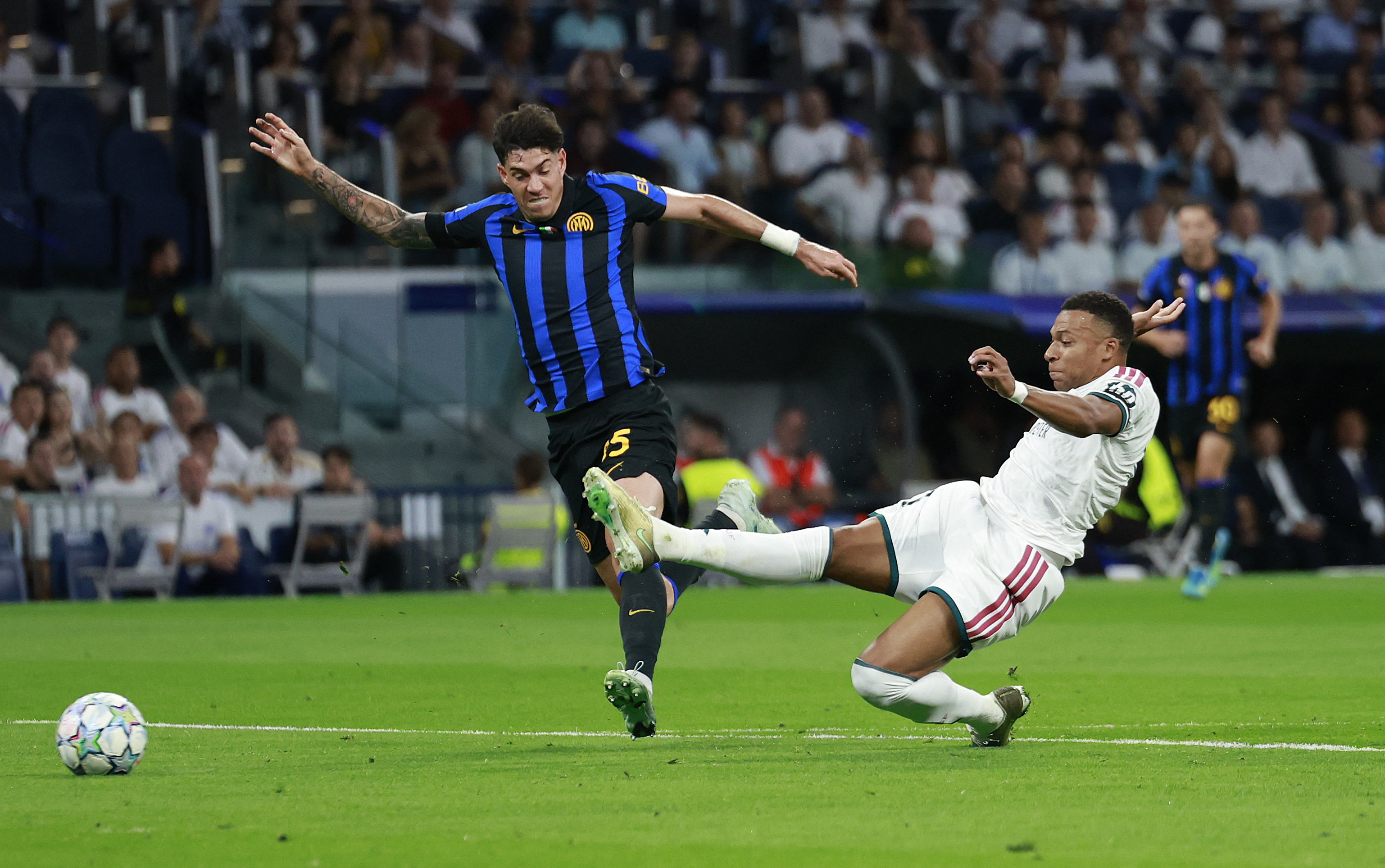 Real Madrid's Kylian Mbappe scores their first goal